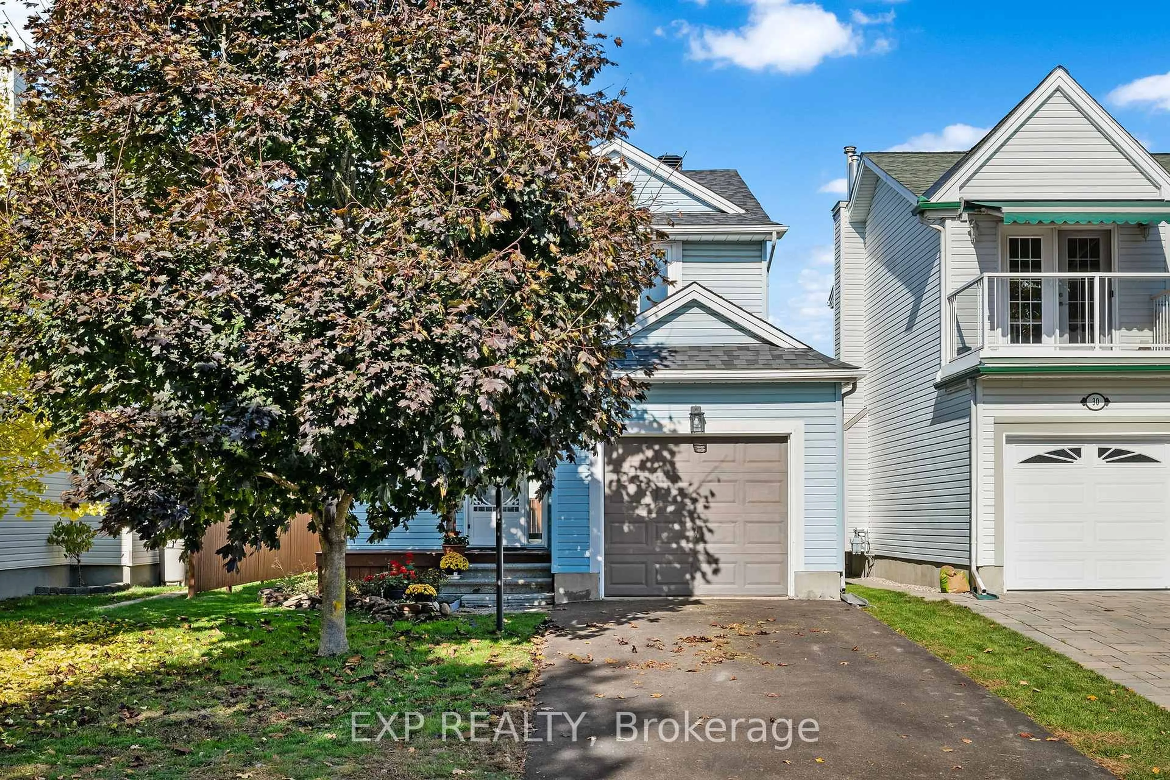 A pic from outside/outdoor area/front of a property/back of a property/a pic from drone, street for 32 Peacock Cres, Ottawa Ontario K2J 3P6