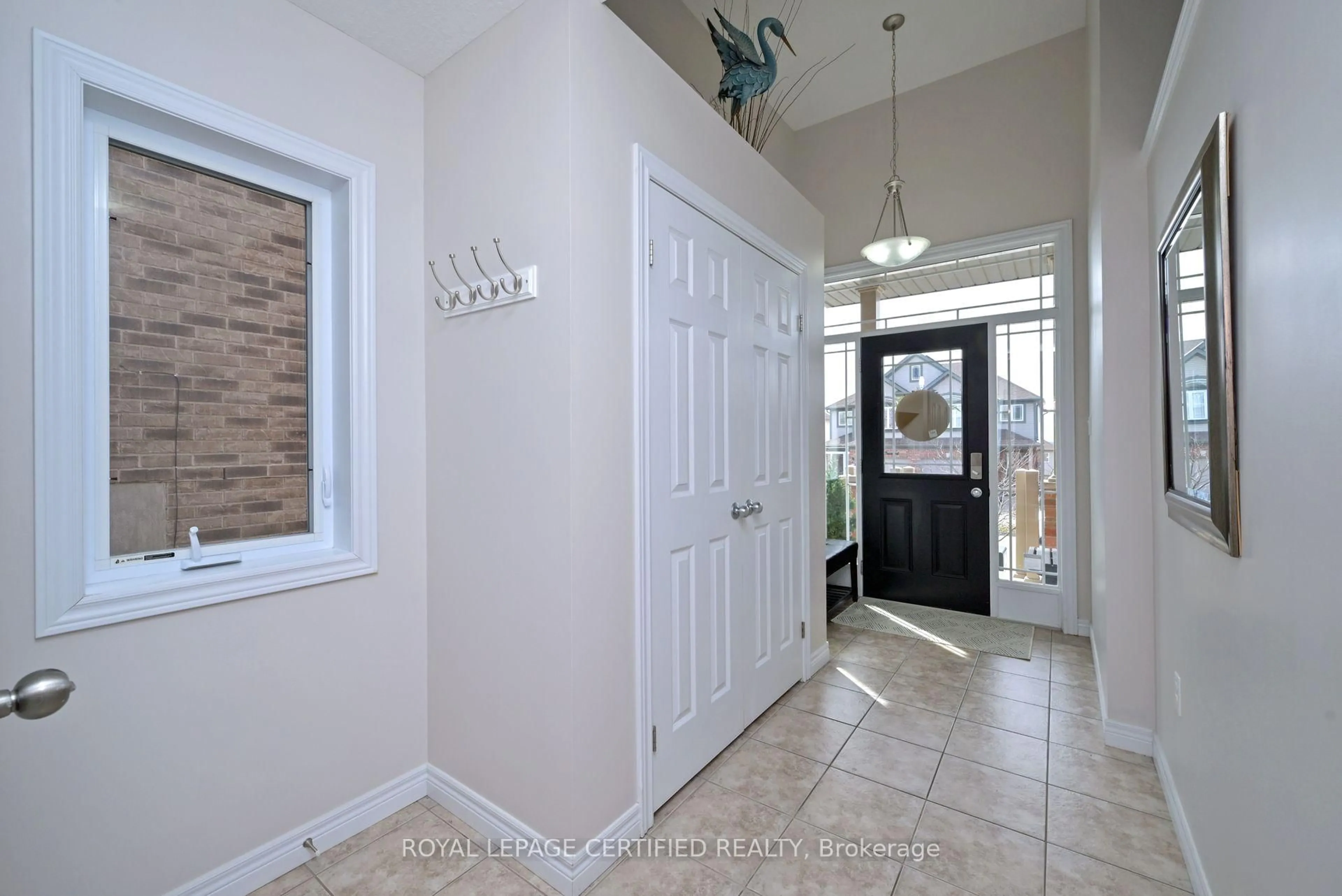 Indoor entryway for 102 Oakes Cres, Guelph Ontario N1E 0J5