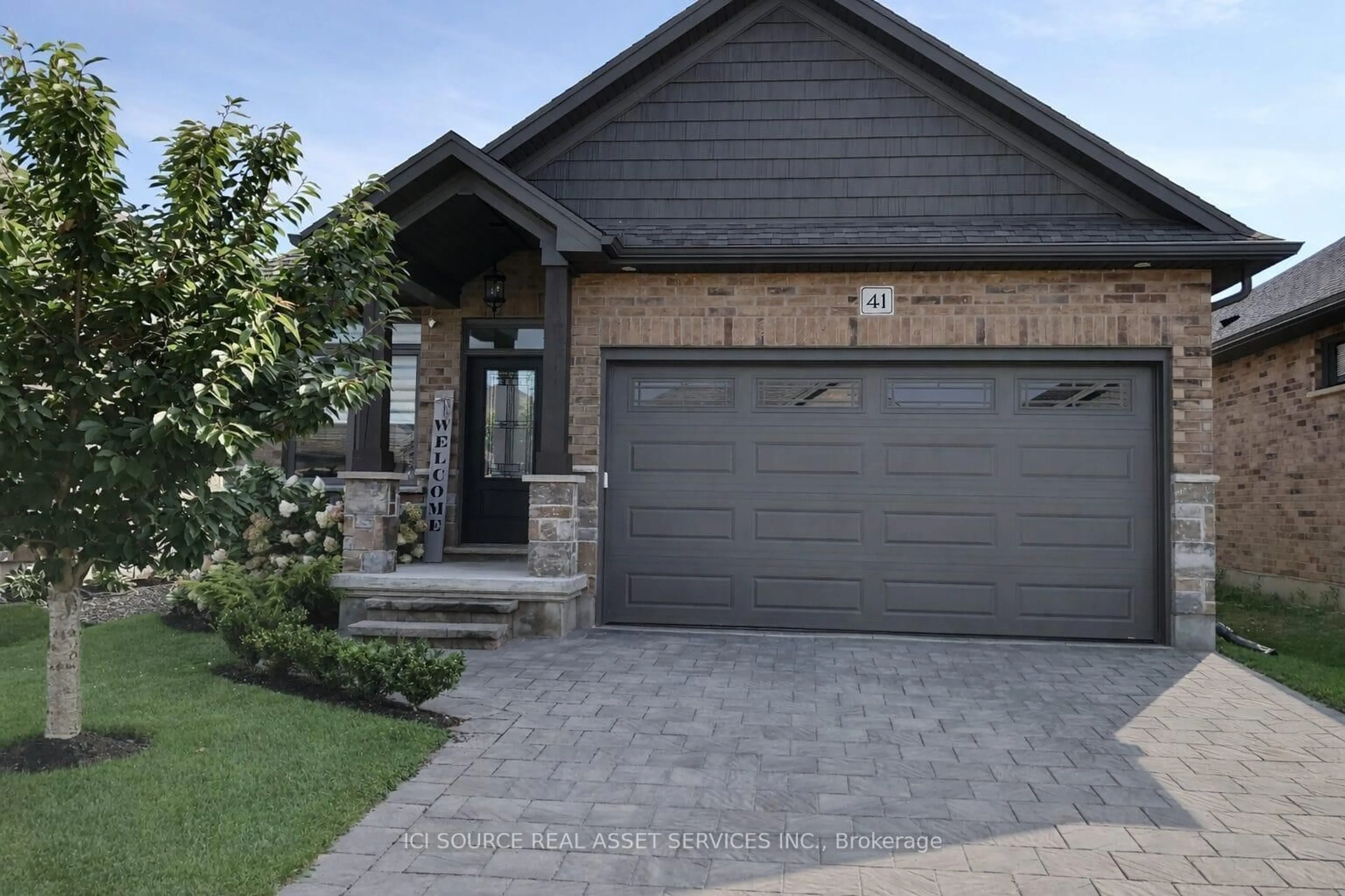 Home with brick exterior material, street for 159 Collins Way #41, Strathroy-Caradoc Ontario N7G 0G8