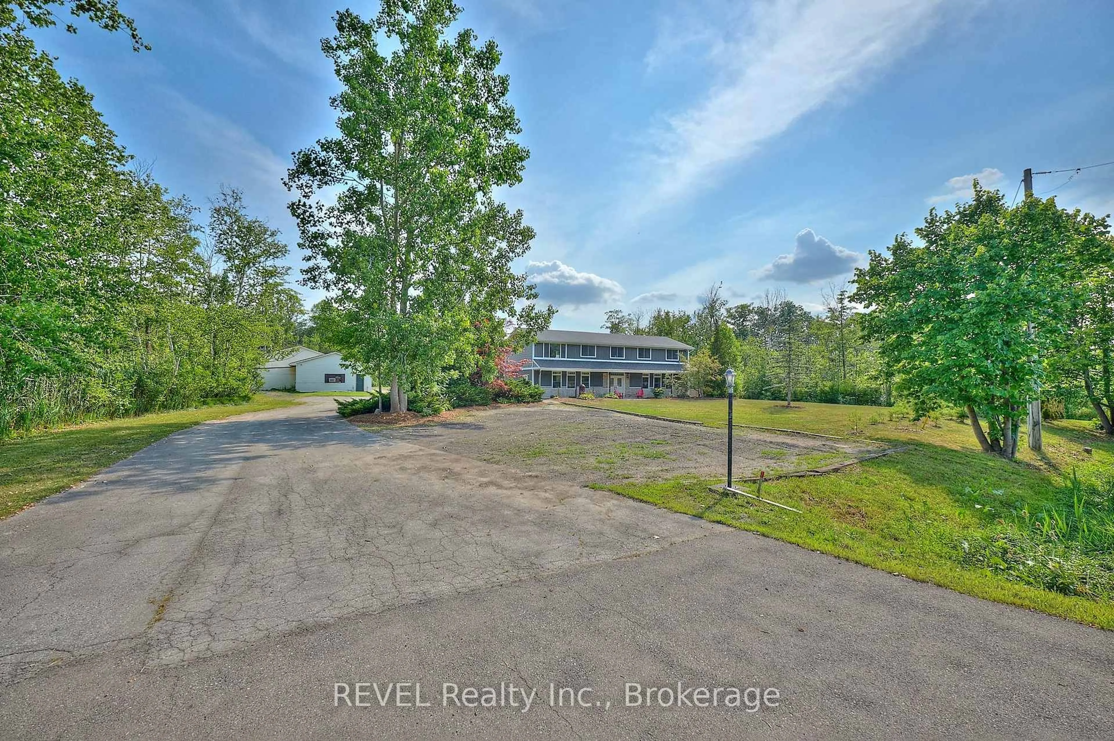 A pic from outside/outdoor area/front of a property/back of a property/a pic from drone, water/lake/river/ocean view for 740 Highway 20, Pelham Ontario L0S 1C0