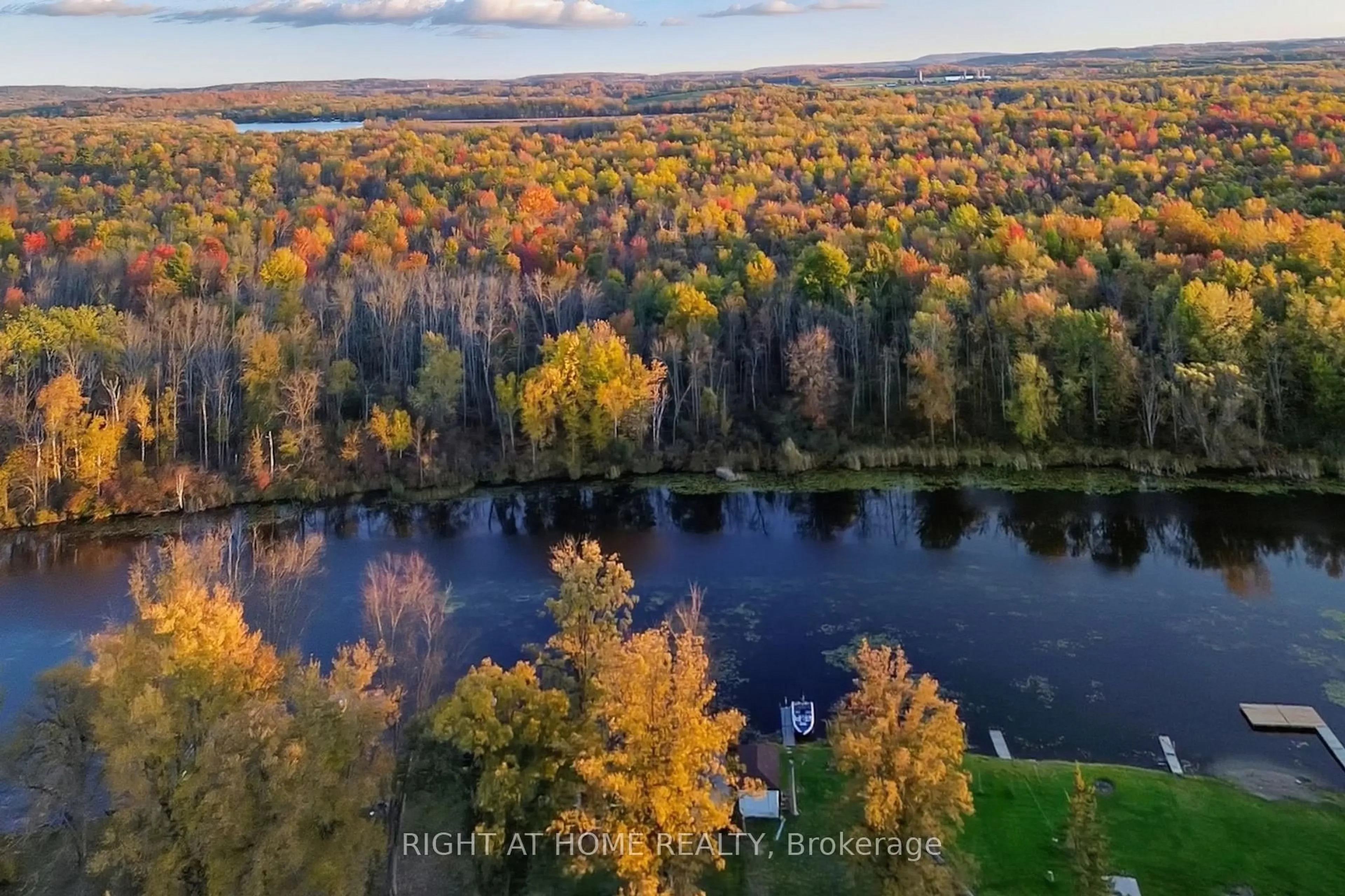 A pic from outside/outdoor area/front of a property/back of a property/a pic from drone, water/lake/river/ocean view for 49 River Rd, Trent Hills Ontario K0L 1L0