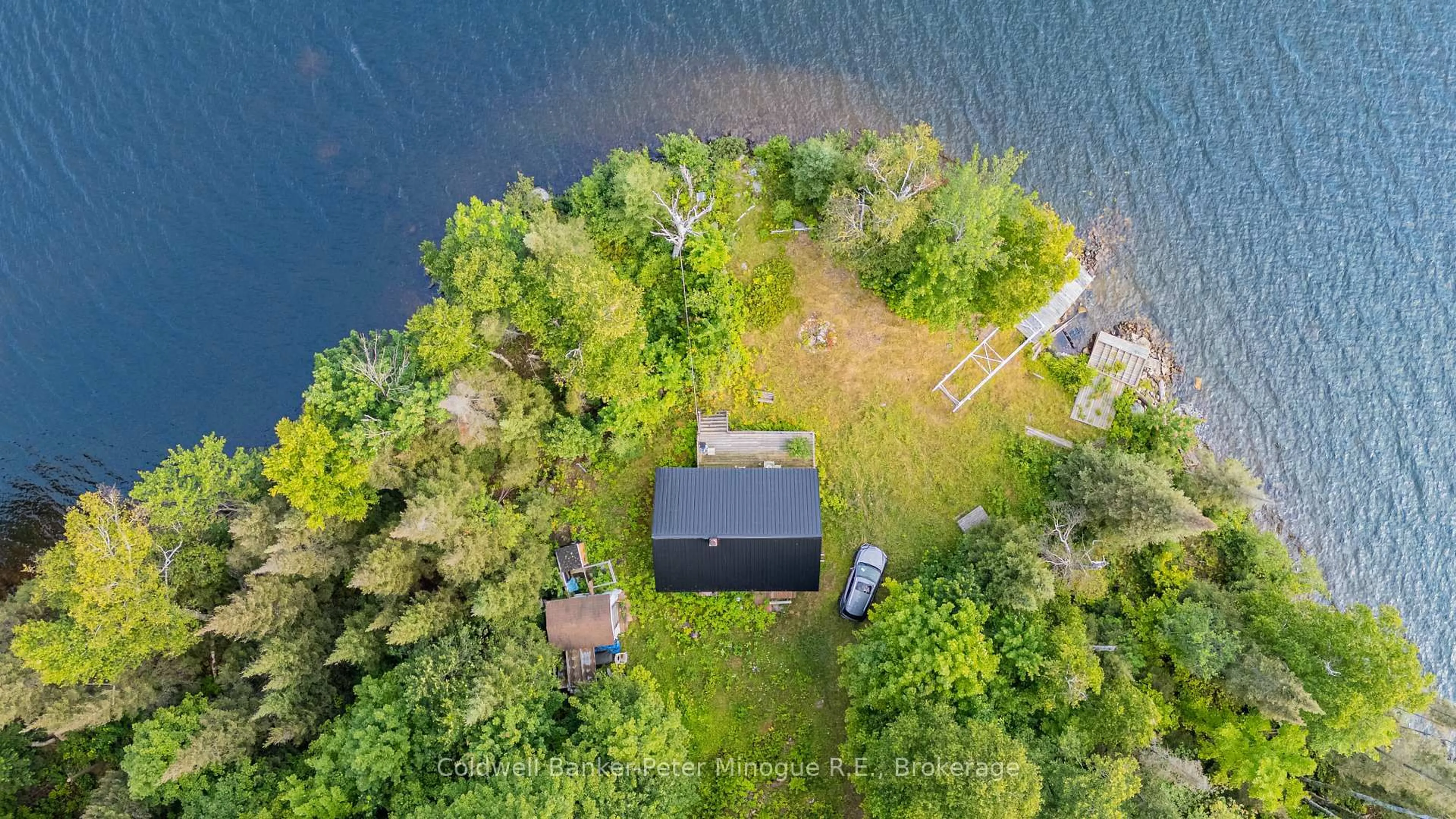 A pic from outside/outdoor area/front of a property/back of a property/a pic from drone, water/lake/river/ocean view for 1757 South Shore Rd, East Ferris Ontario P0H 1B0