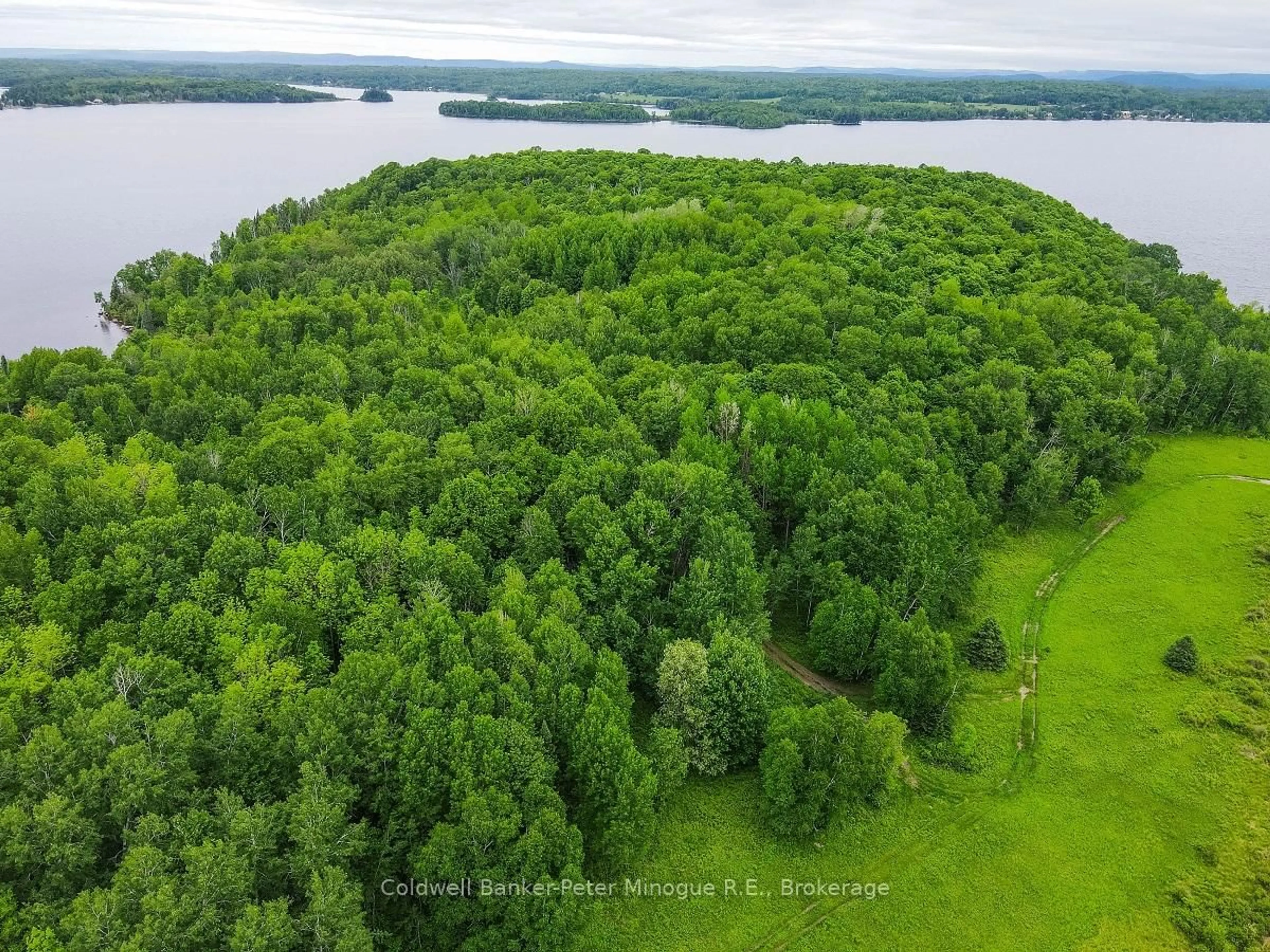 A pic from outside/outdoor area/front of a property/back of a property/a pic from drone, forest/trees view for 1757 South Shore Rd, East Ferris Ontario P0H 1B0