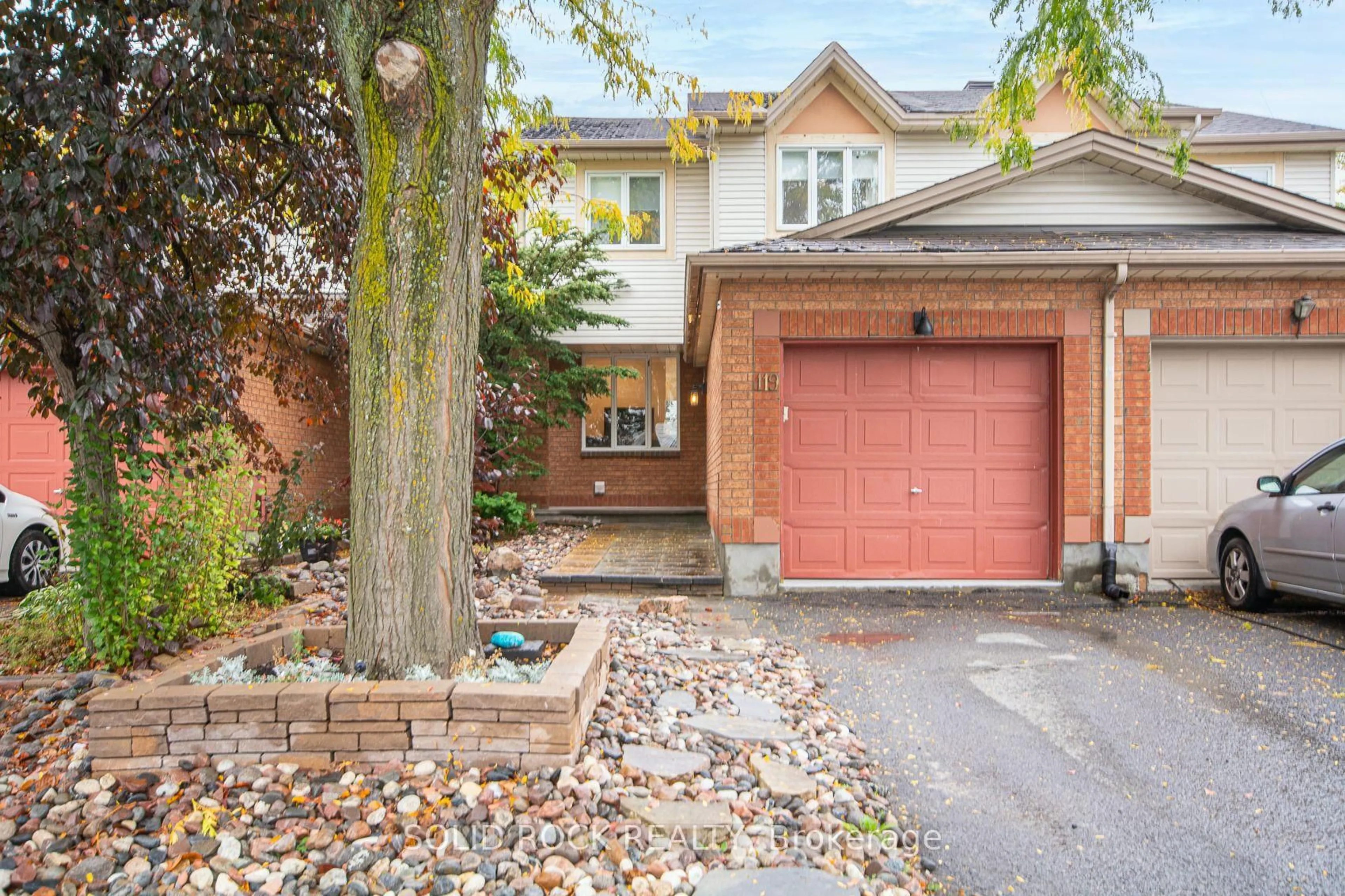 Home with brick exterior material, street for 119 Kincardine Dr, Ottawa Ontario K2V 1B1