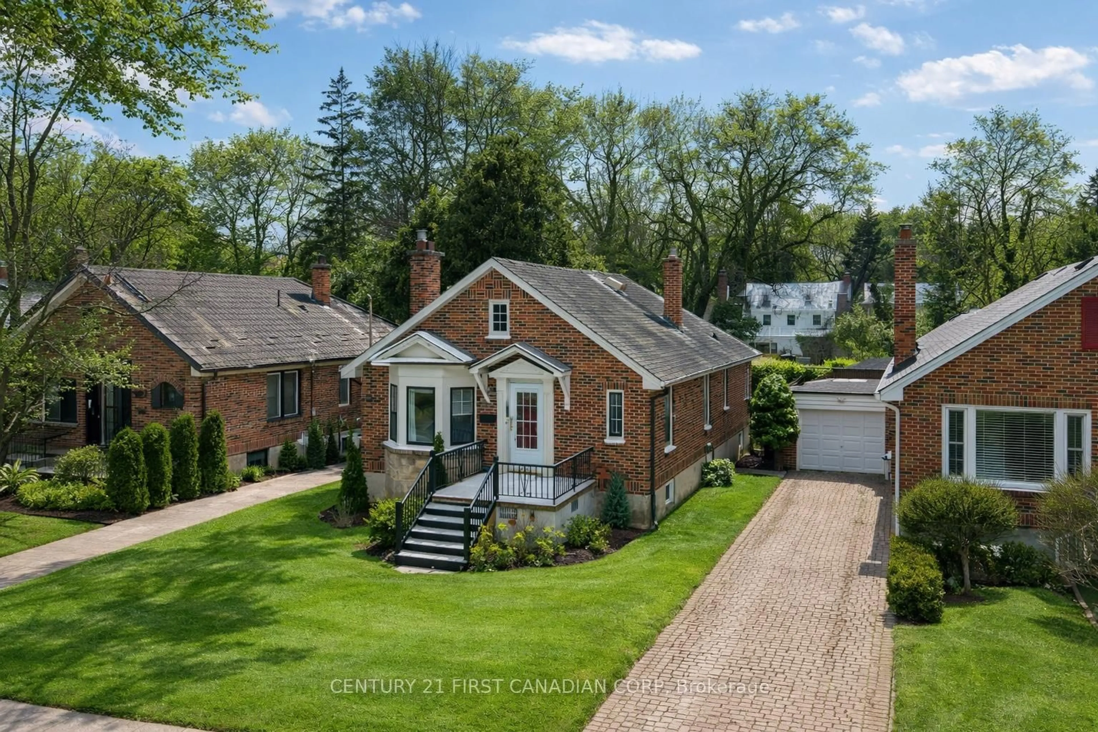 Home with brick exterior material, street for 961 Harrison Ave, London East Ontario N5Y 2T8