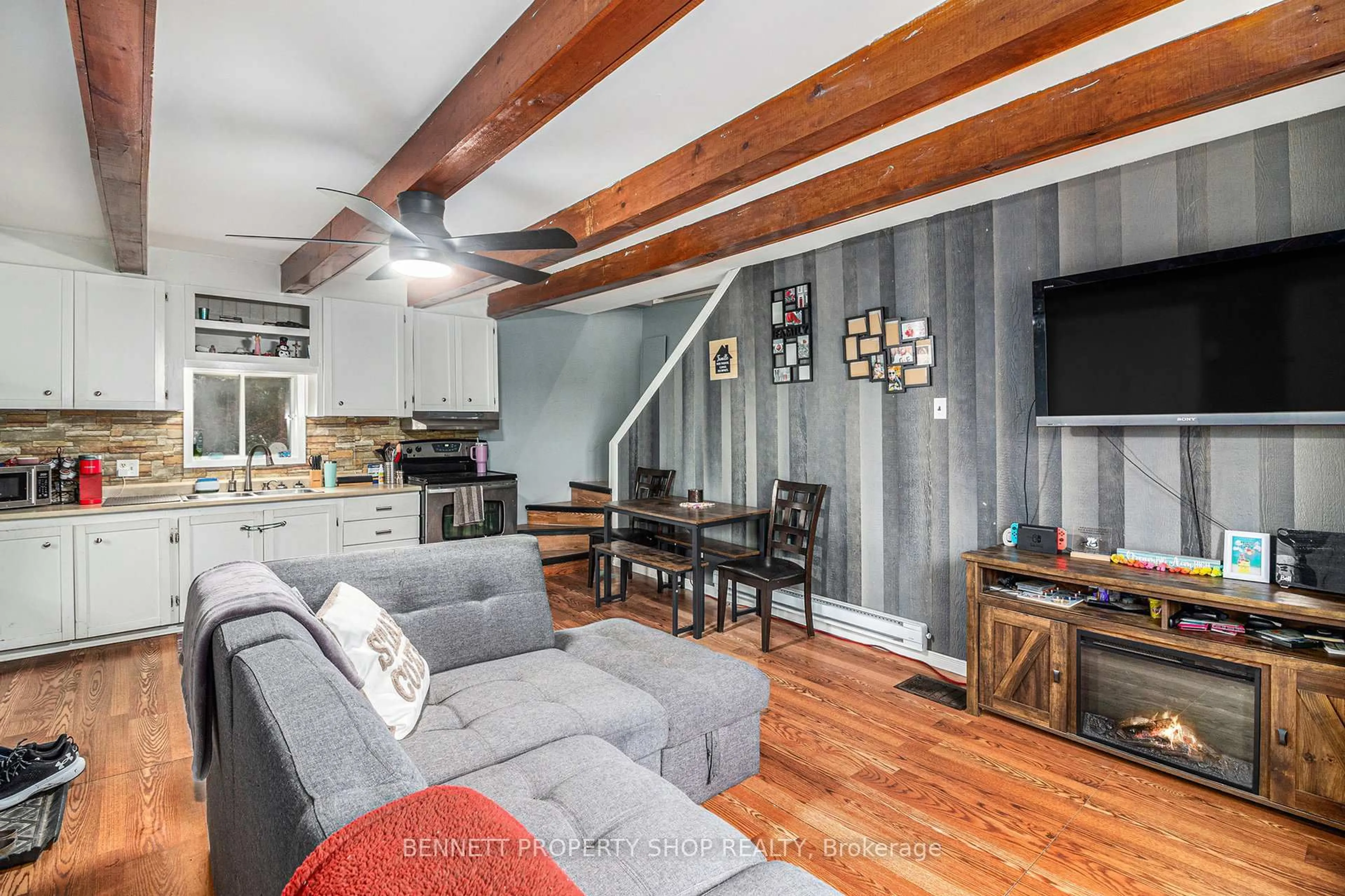 Living room with furniture, wood/laminate floor for 2489 Du Lac Rd, Clarence-Rockland Ontario K0A 3N0