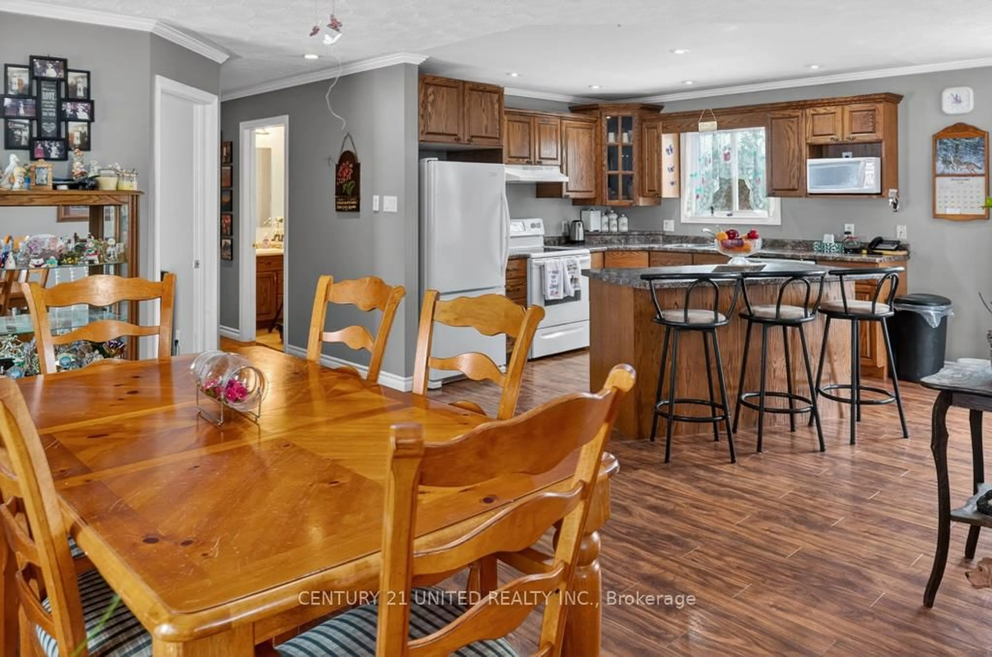 Open concept kitchen, wood/laminate floor for 37 Southside Rd, Kawartha Lakes Ontario K9V 0K3