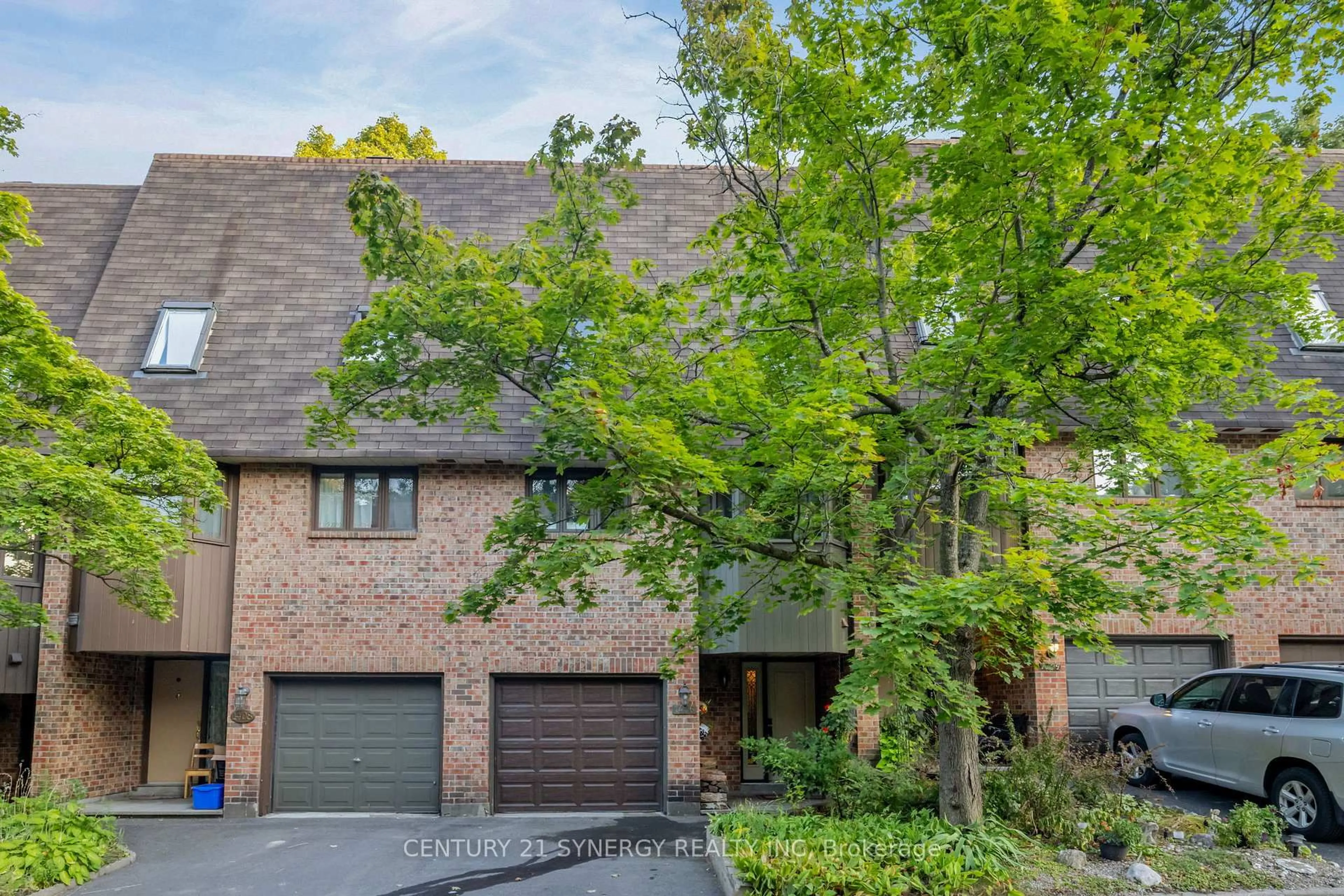 Home with brick exterior material, street for 1406 Forge St, Ottawa Ontario K1T 2T9