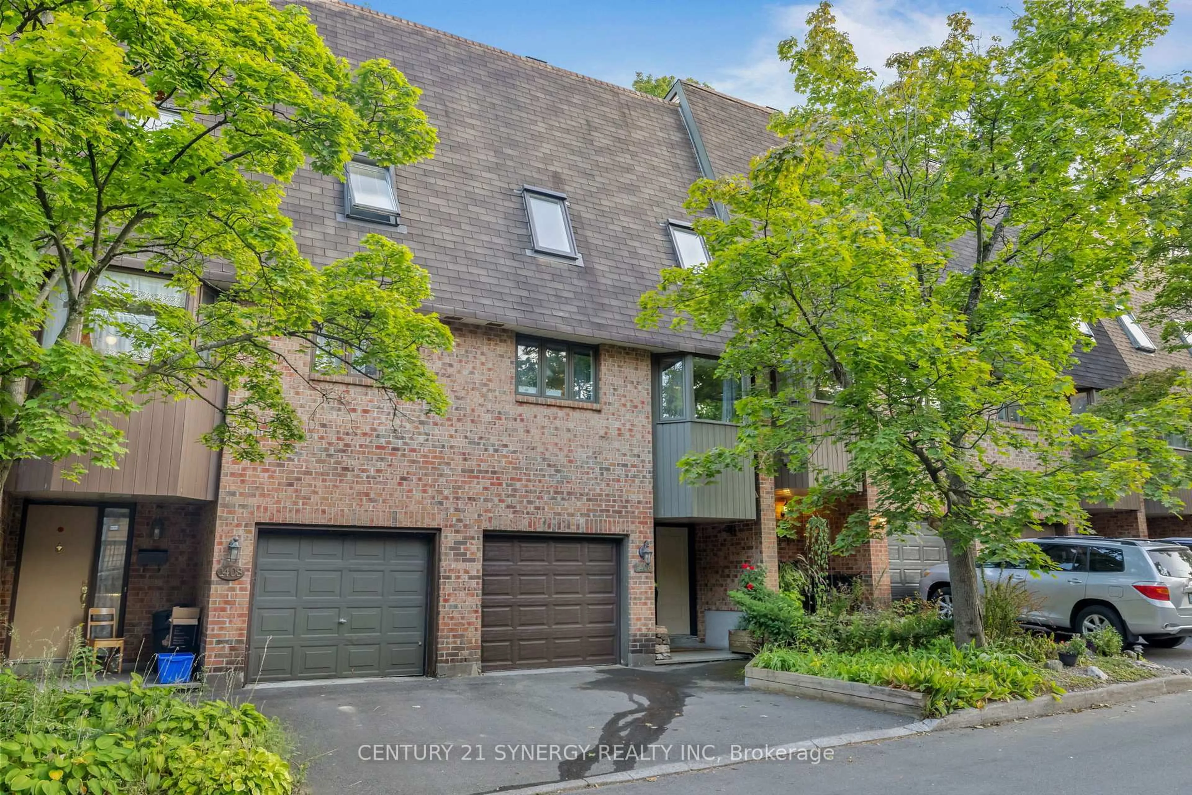 Home with brick exterior material, street for 1406 Forge St, Ottawa Ontario K1T 2T9