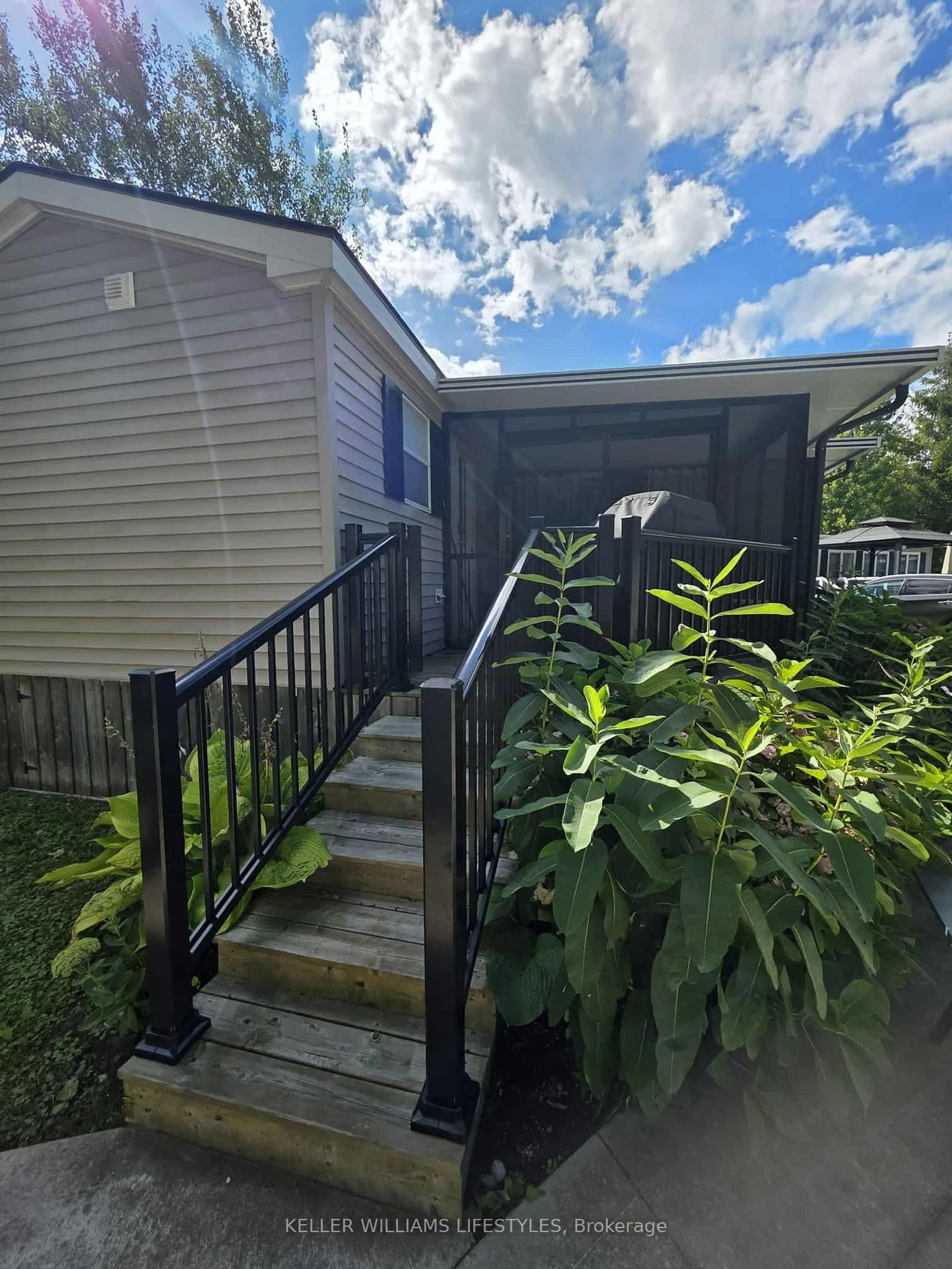 Home with vinyl exterior material, street for 9338 West Ipperwash Rd #JJ22, Lambton Shores Ontario N0N 1J2