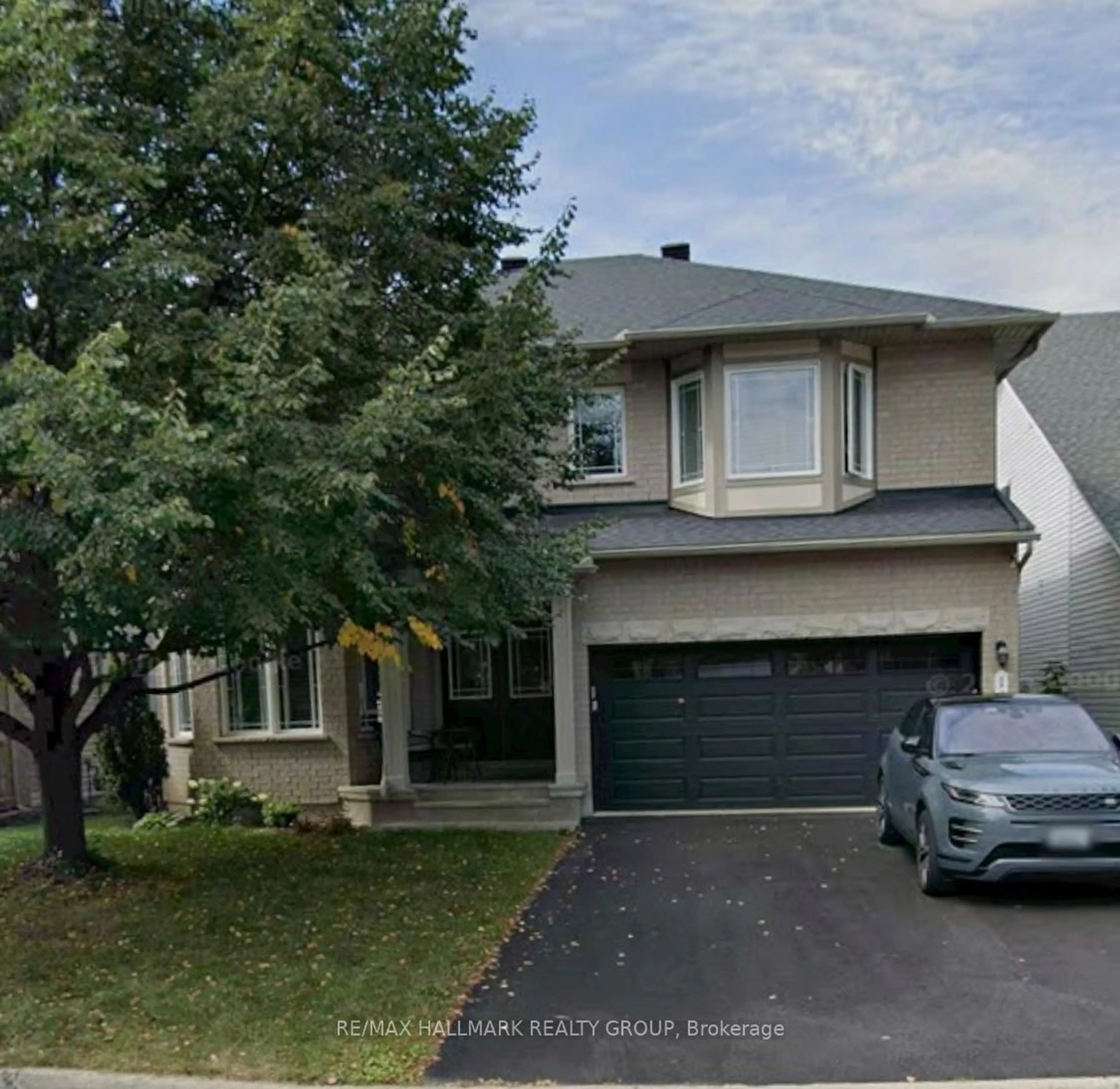 Home with vinyl exterior material, street for 149 COPPERWOOD St, Ottawa Ontario K1C 7S3