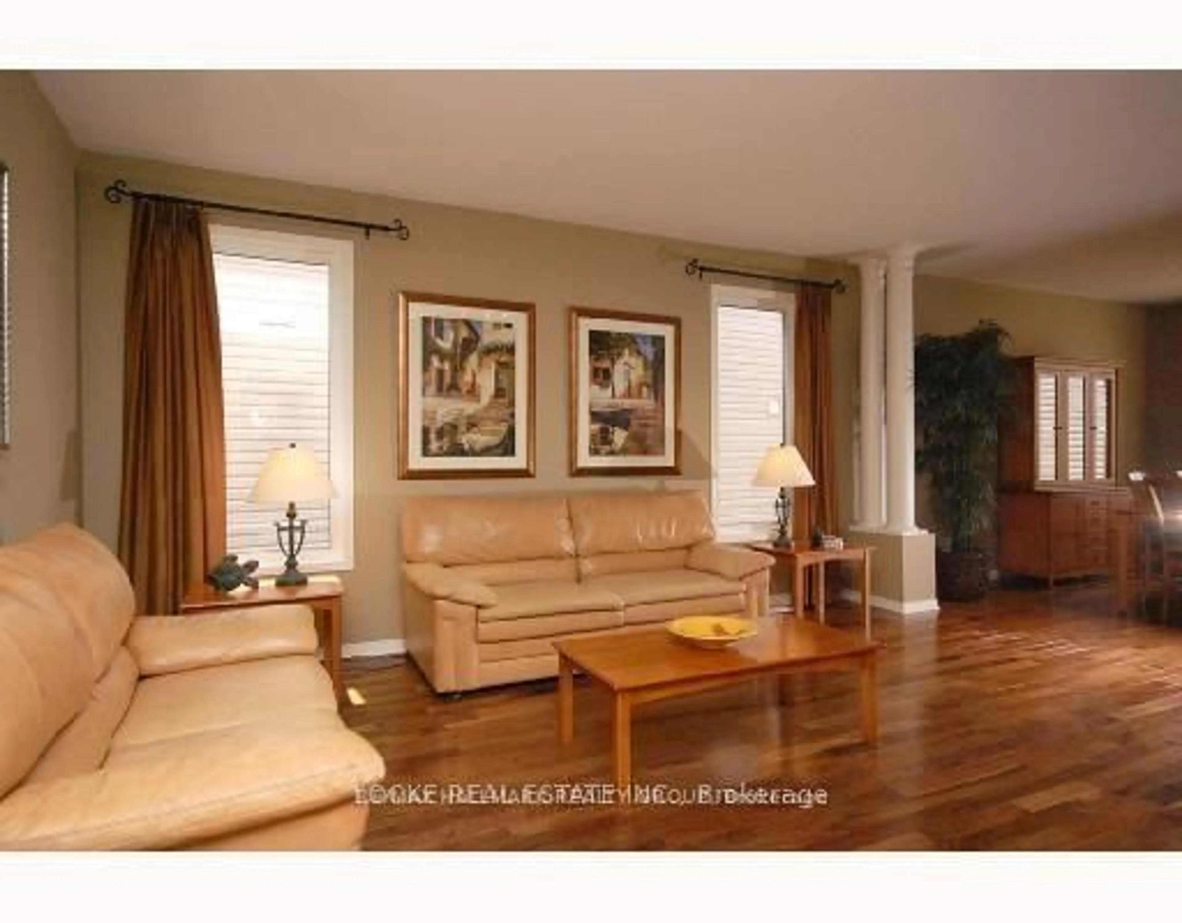 Living room with furniture, wood/laminate floor for 149 COPPERWOOD St, Ottawa Ontario K1C 7S3