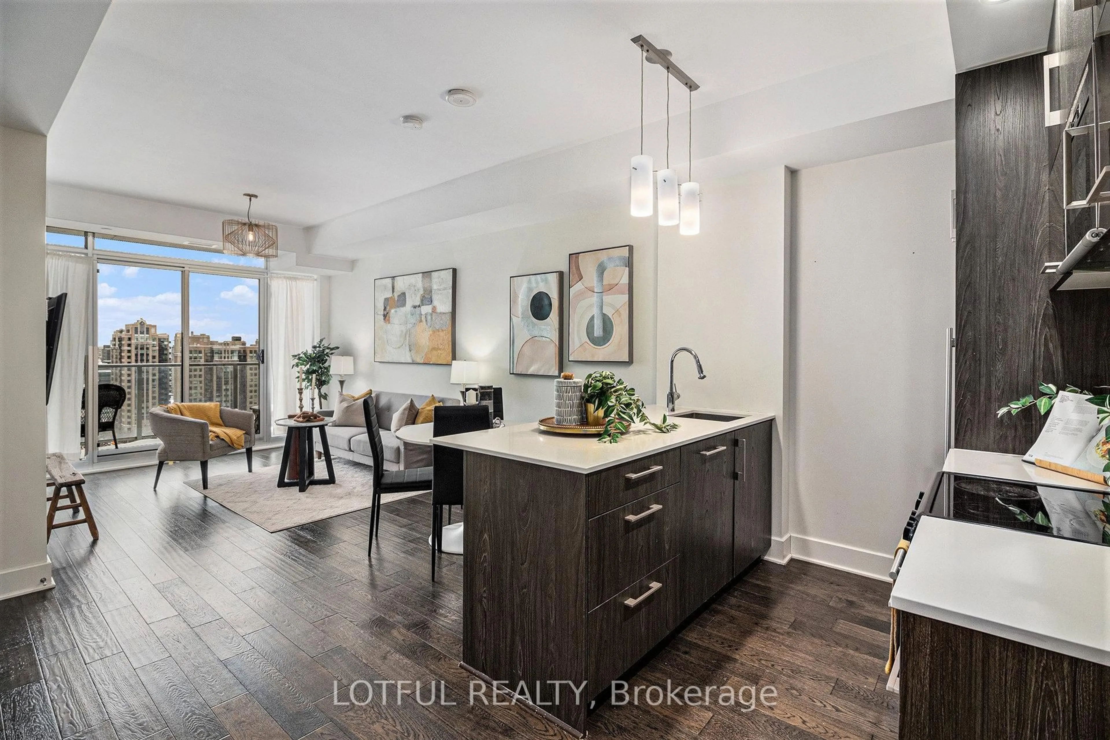 Open concept kitchen, wood/laminate floor for 255 BAY St #1604, Ottawa Ontario K1R 0C5