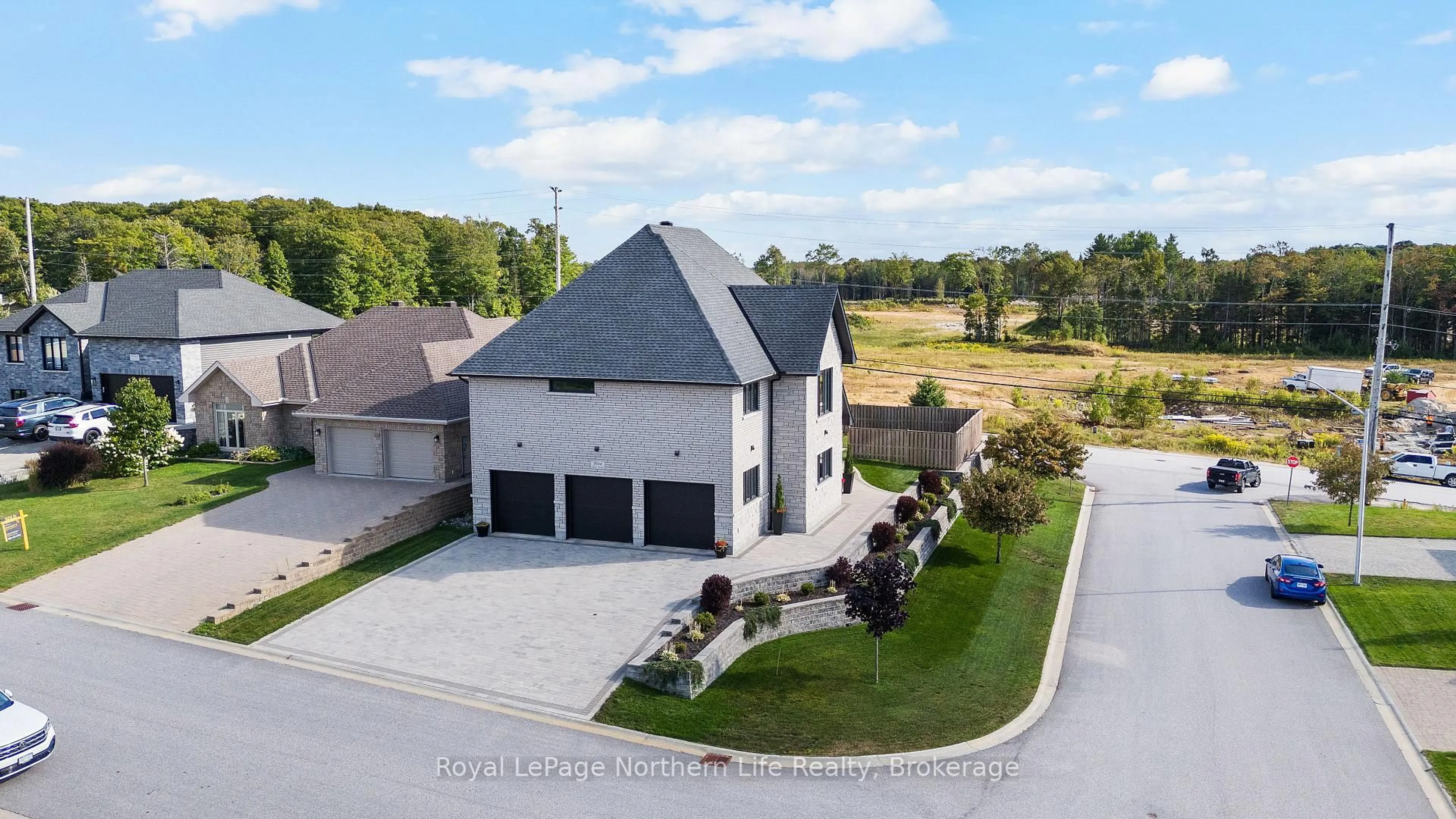 A pic from outside/outdoor area/front of a property/back of a property/a pic from drone, unknown for 5 ZEPHYR Hts, North Bay Ontario P1B 8G2