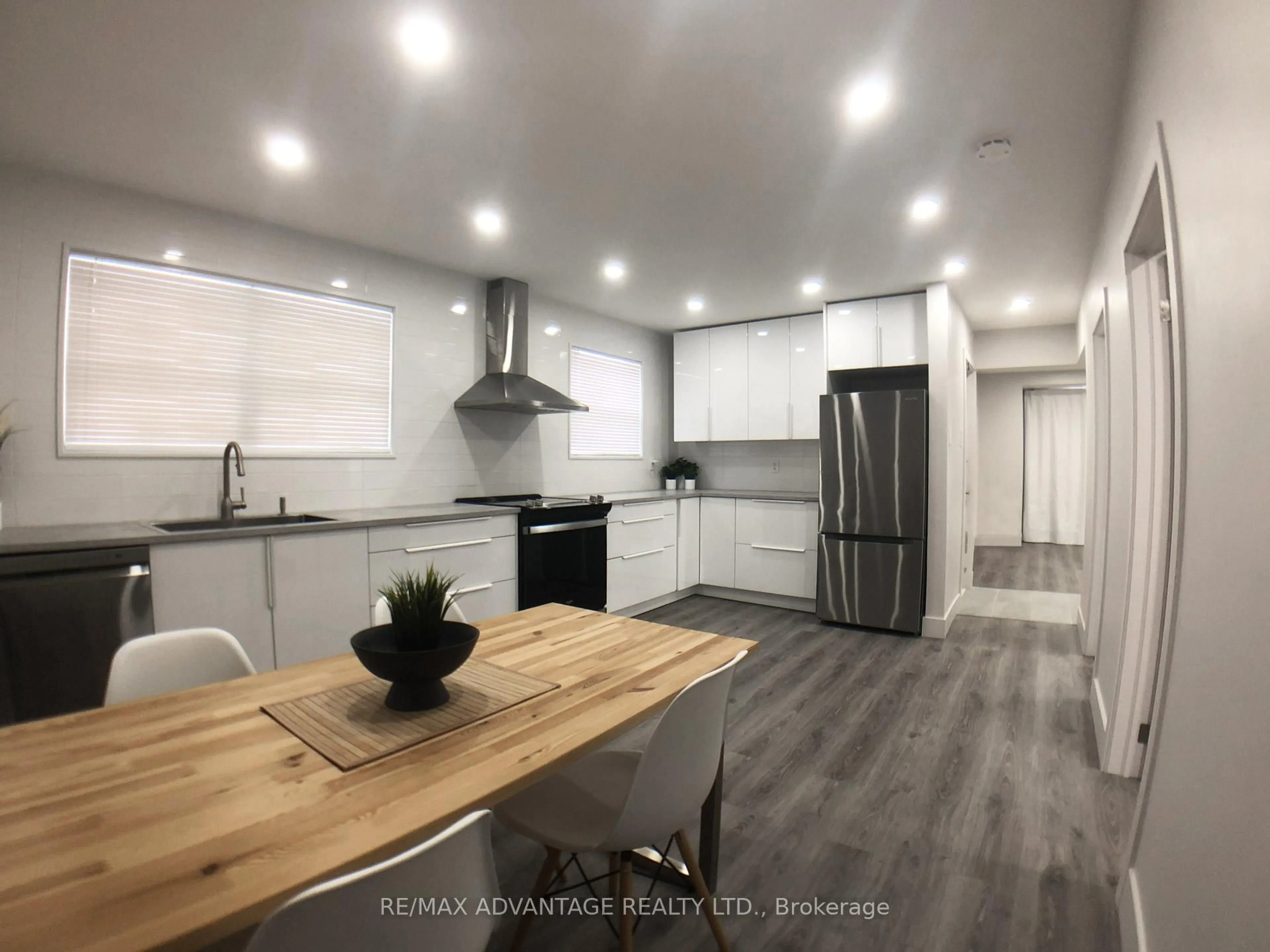 Open concept kitchen, wood/laminate floor for 206-208 Barry Pl, London North Ontario N6H 1K1