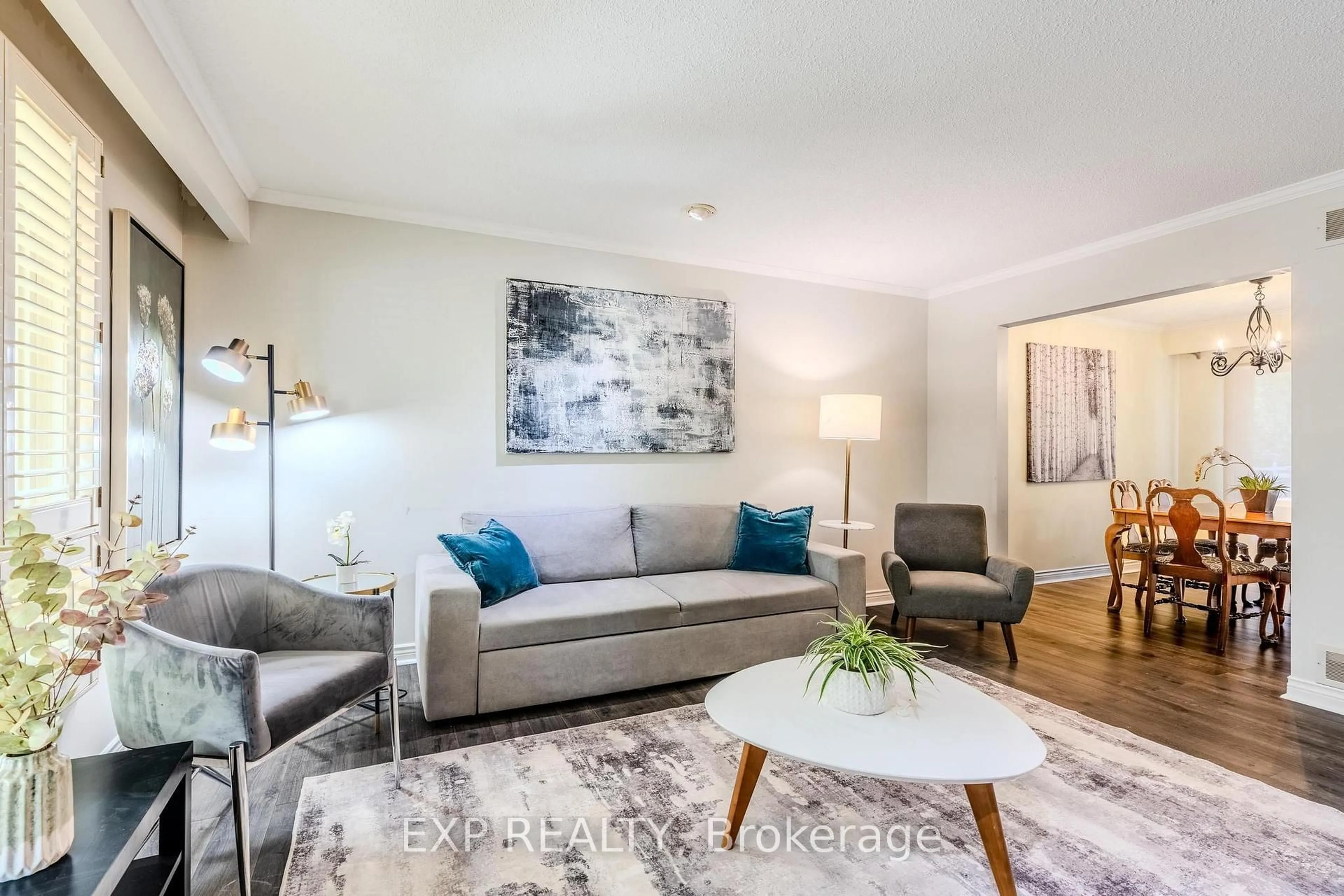 Living room with furniture, wood/laminate floor for 172 Hanover Pl, Hamilton Ontario L8K 5X6