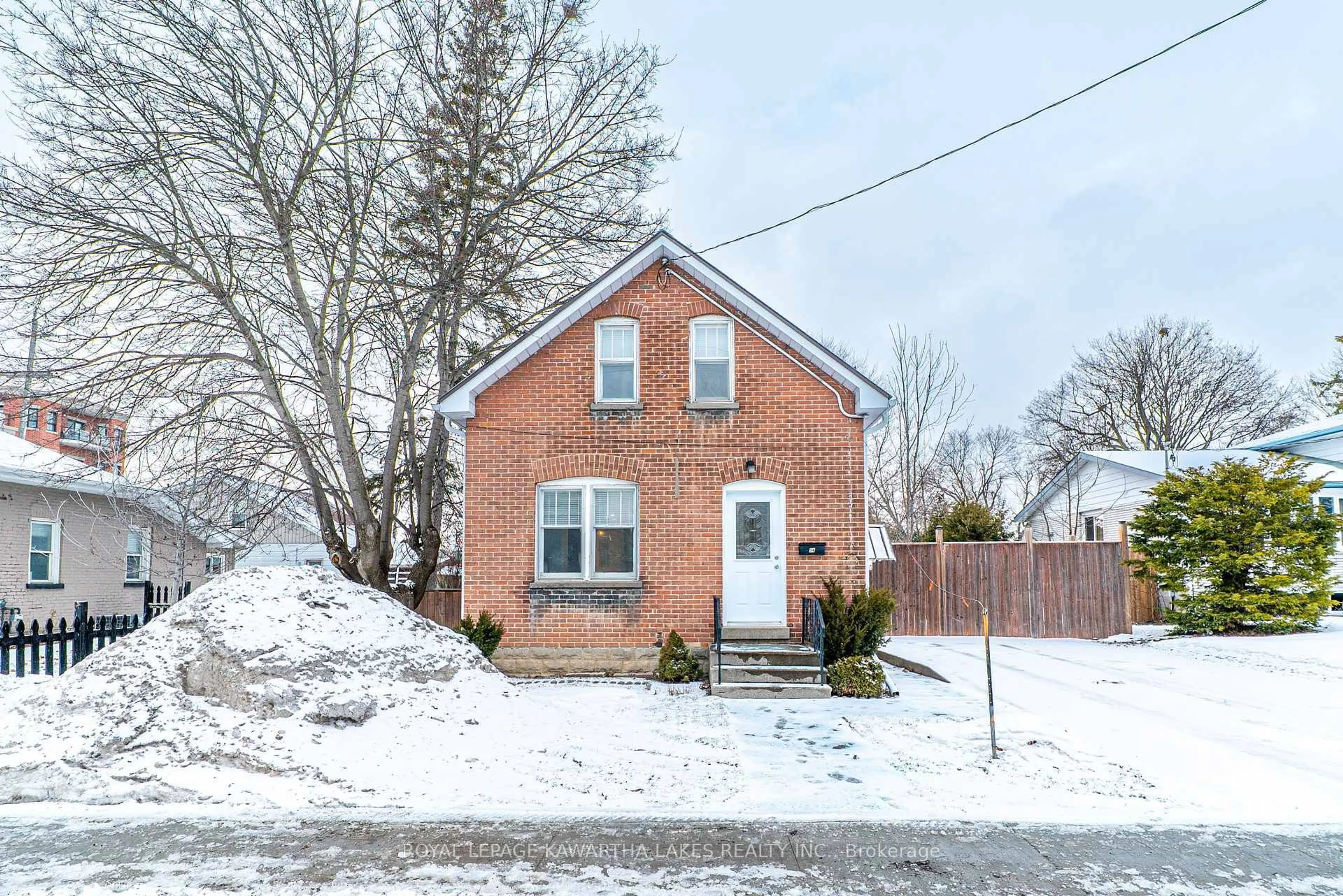 Home with brick exterior material, street for 54 Glenelg St, Kawartha Lakes Ontario K9V 2V2
