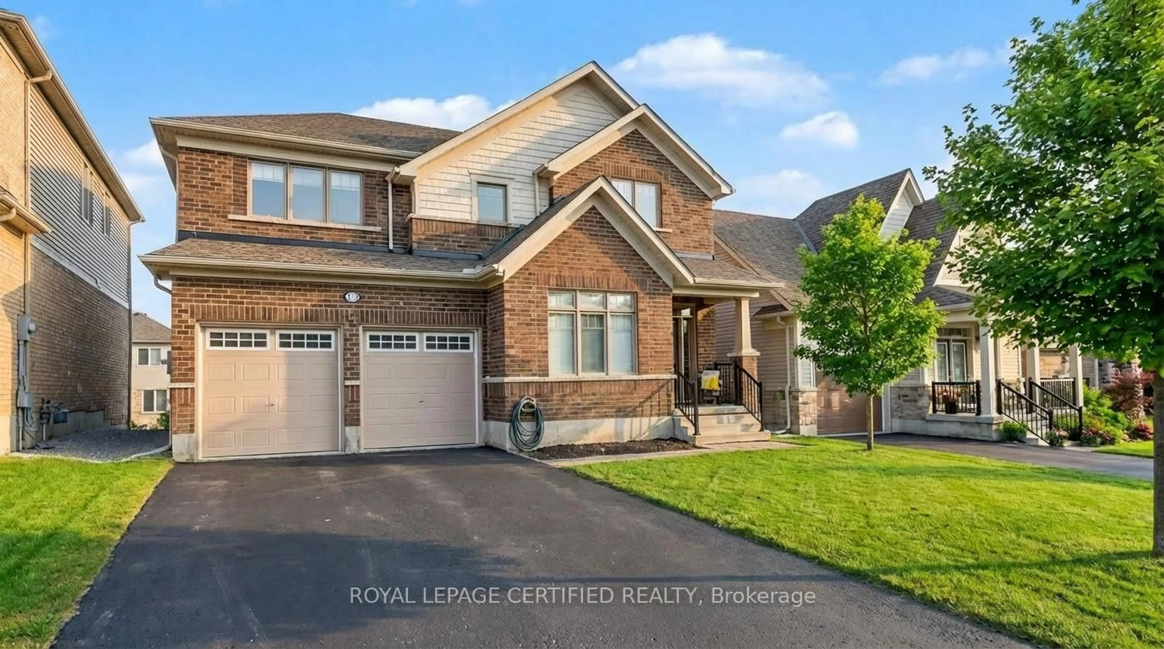 Home with brick exterior material, street for 123 Rea Dr, Centre Wellington Ontario N1M 0J8