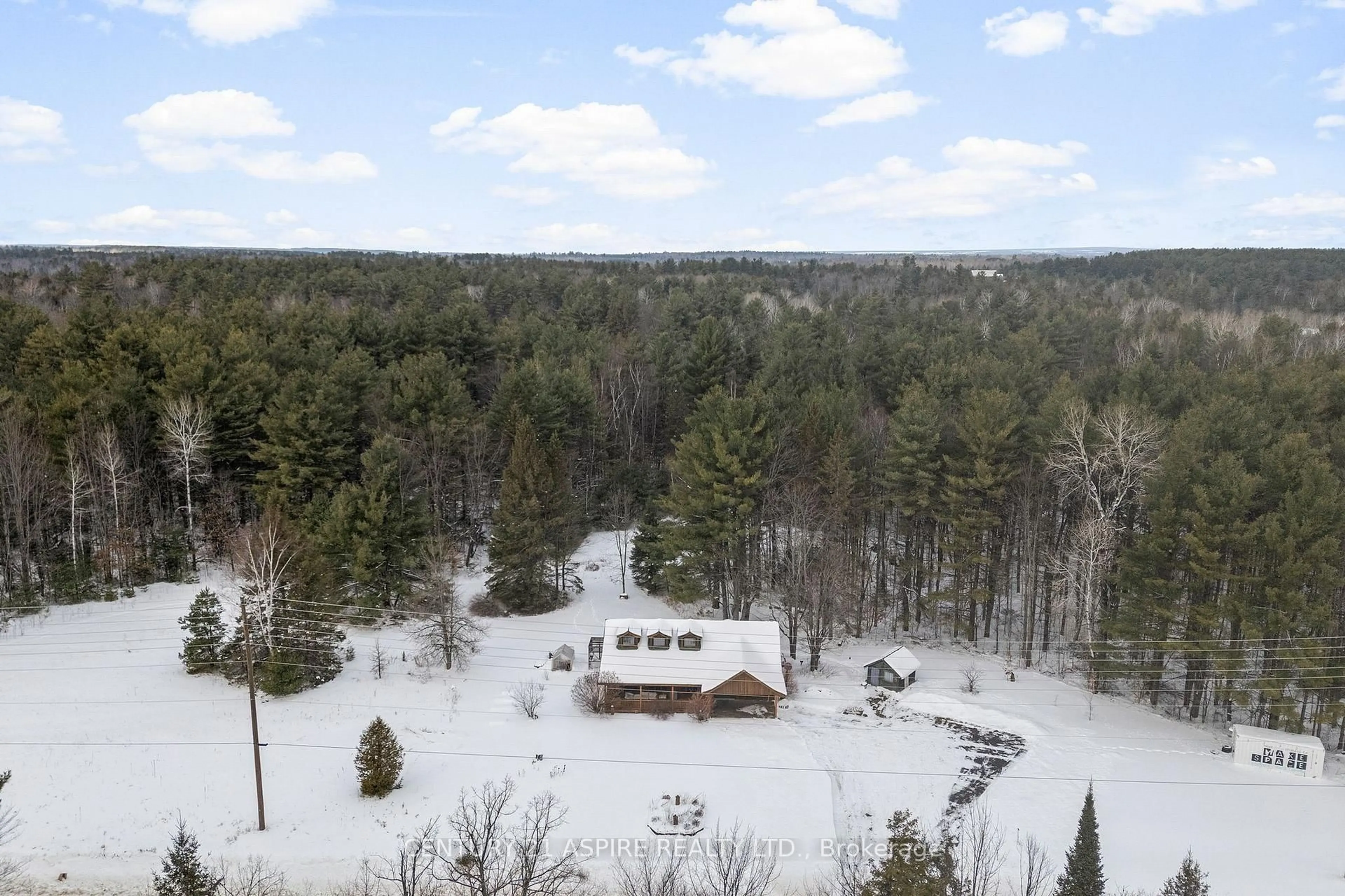 A pic from outside/outdoor area/front of a property/back of a property/a pic from drone, forest/trees view for 400 Calabogie Rd, Arnprior Ontario K7S 3G8