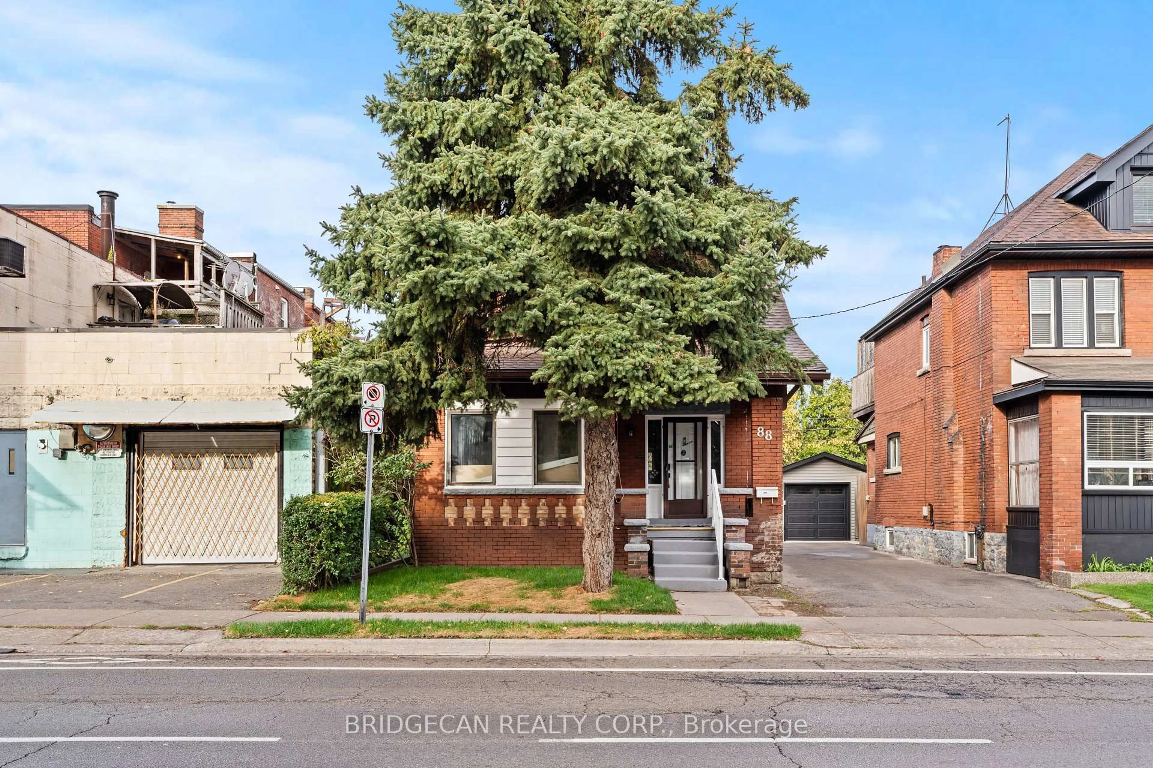 Home with brick exterior material, street for 88 Gage Ave, Hamilton Ontario L8M 3C9