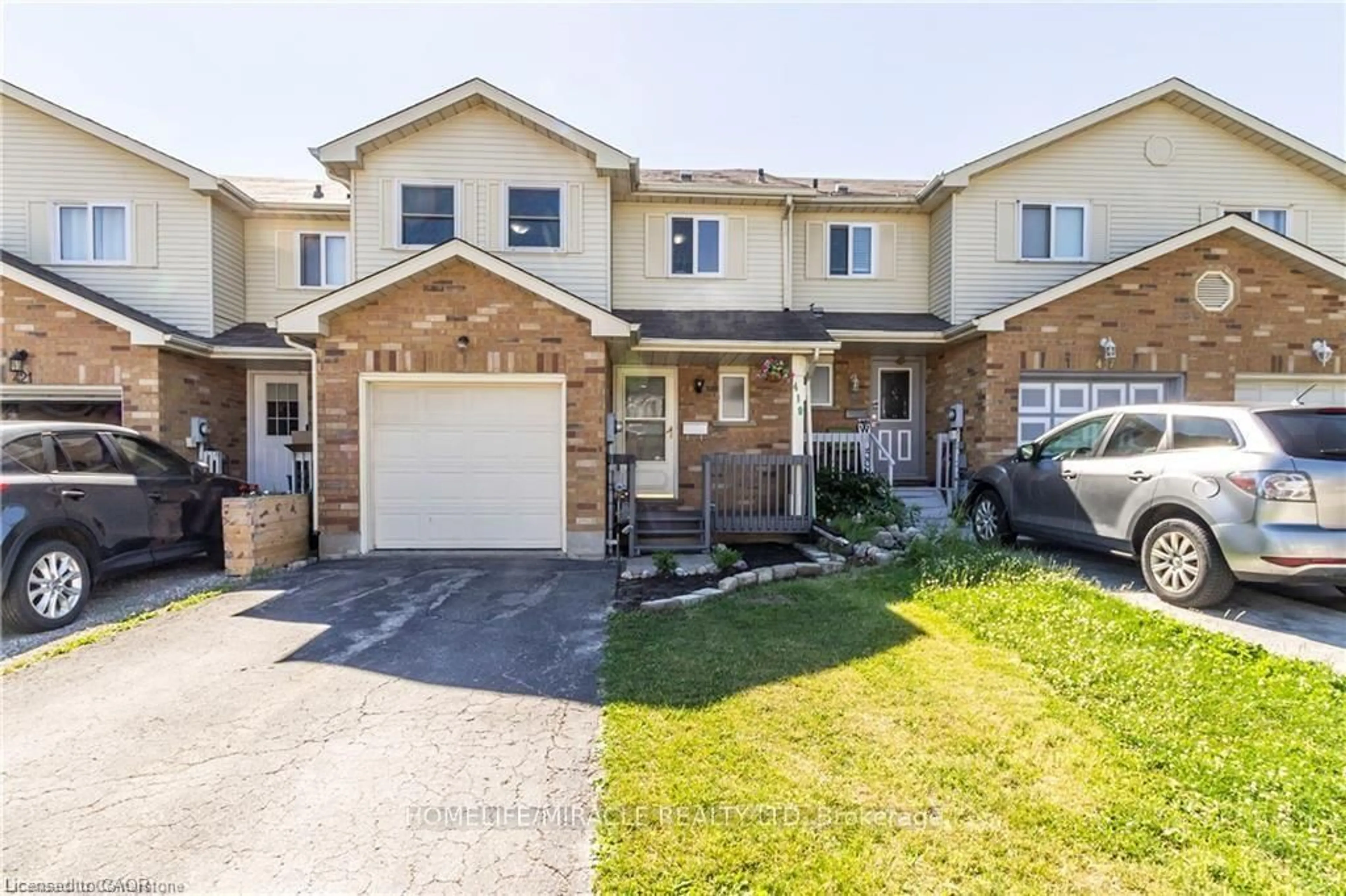 Home with brick exterior material, street for 419 Downsview Pl, Waterloo Ontario N2K 3T9