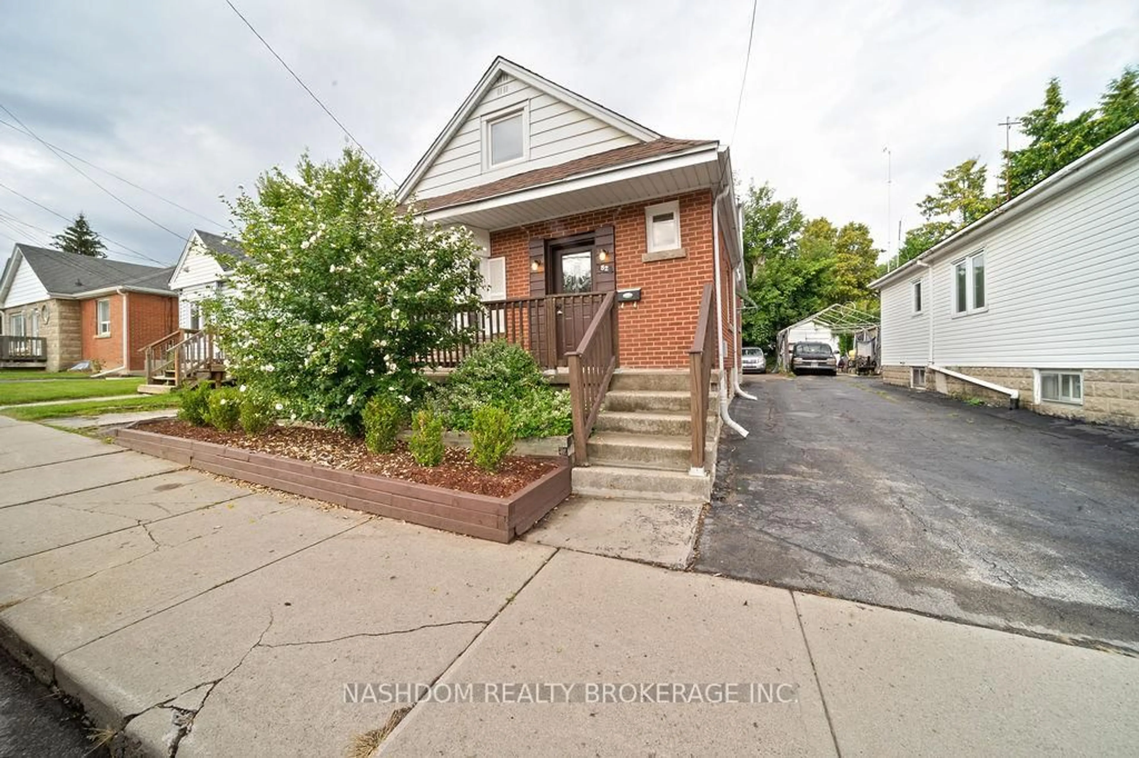 Home with brick exterior material, street for 82 Whitney Ave, Hamilton Ontario L8S 2G5