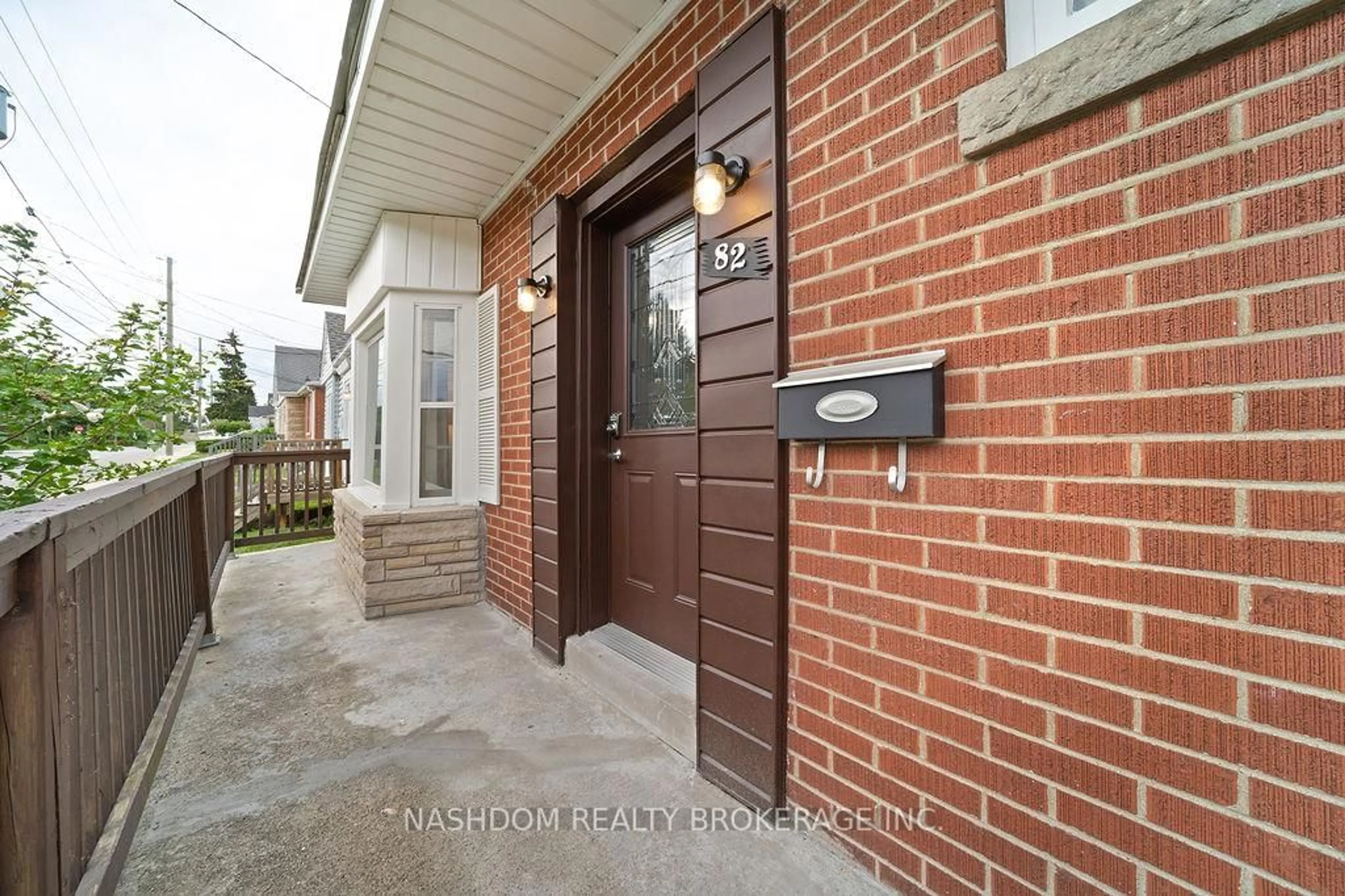 Home with brick exterior material, street for 82 Whitney Ave, Hamilton Ontario L8S 2G5
