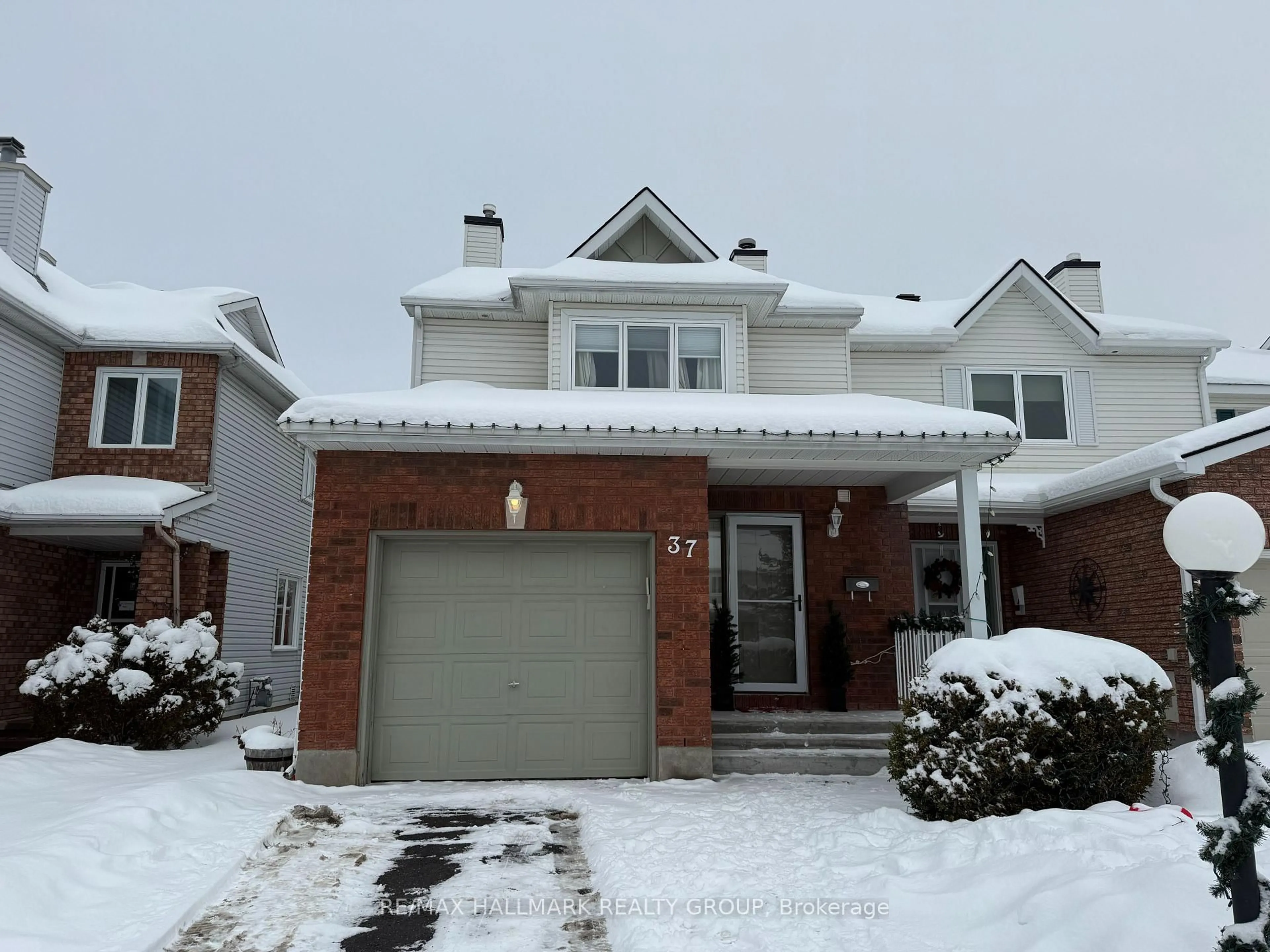 Home with brick exterior material, street for 37 Roblyn Way, Ottawa Ontario K2G 5Z5