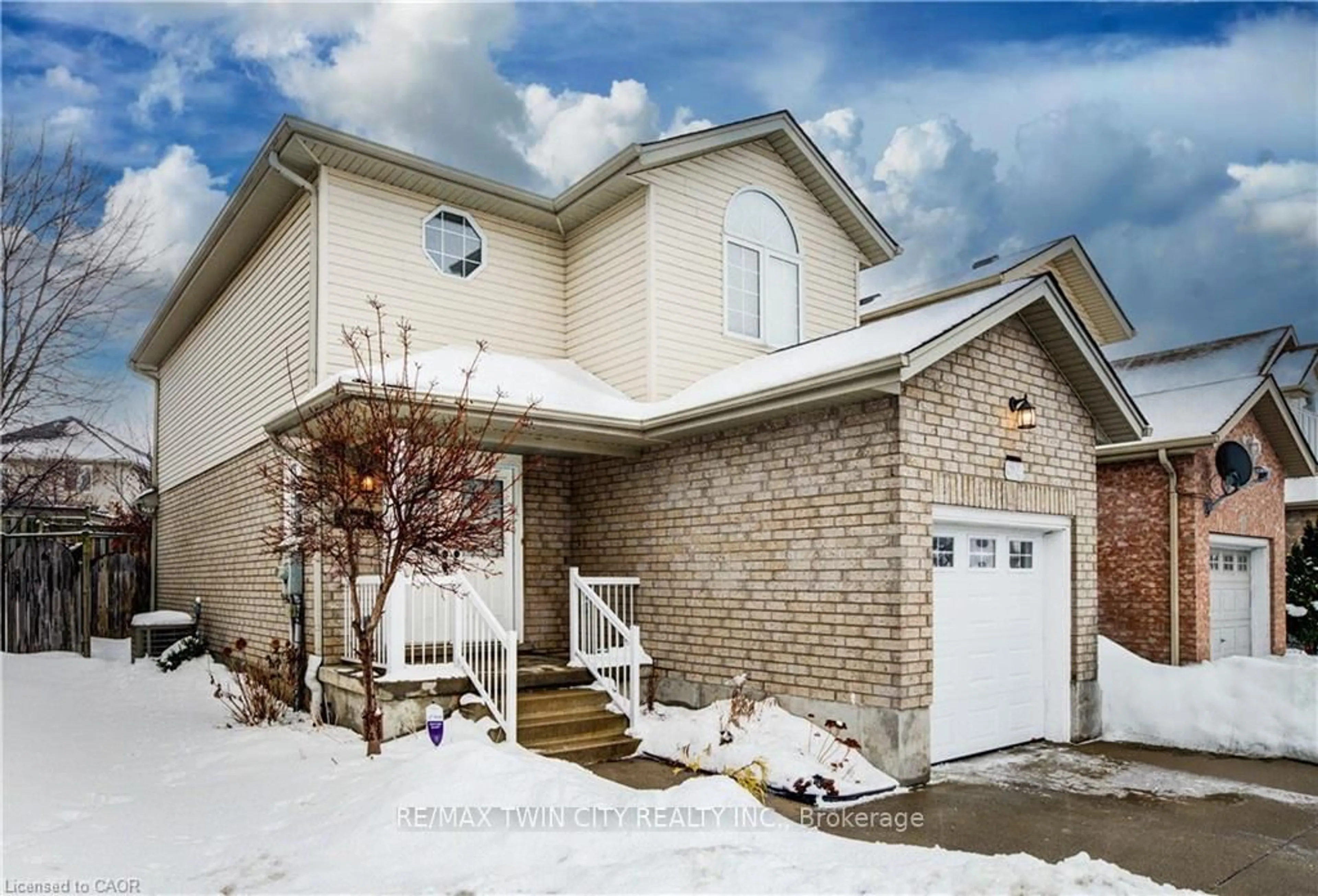 Home with brick exterior material, street for 524 WINDFLOWER Cres, Kitchener Ontario N2E 3S9