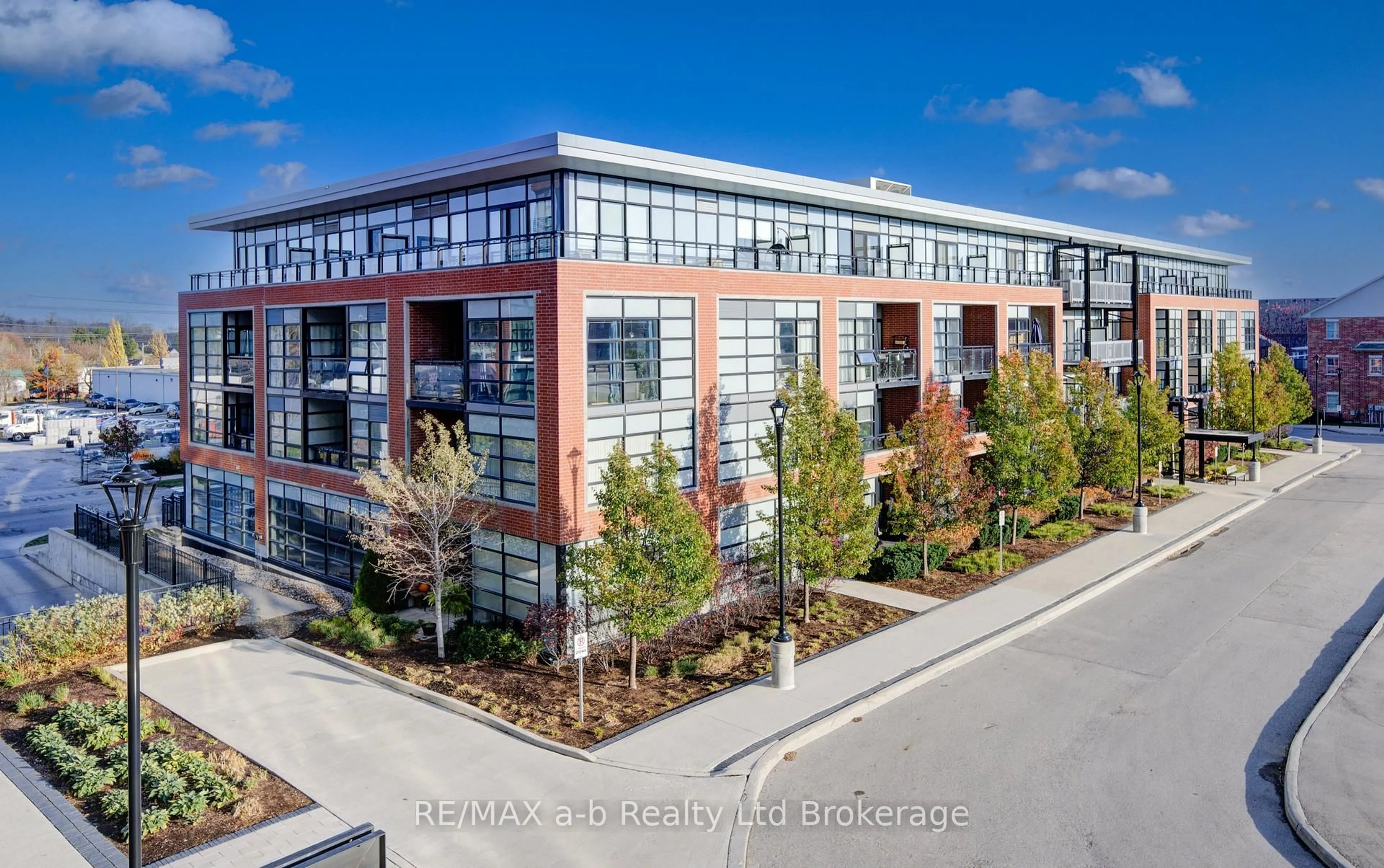 A pic from outside/outdoor area/front of a property/back of a property/a pic from drone, building for 155 St Leger St #415, Kitchener Ontario N2H 0B9