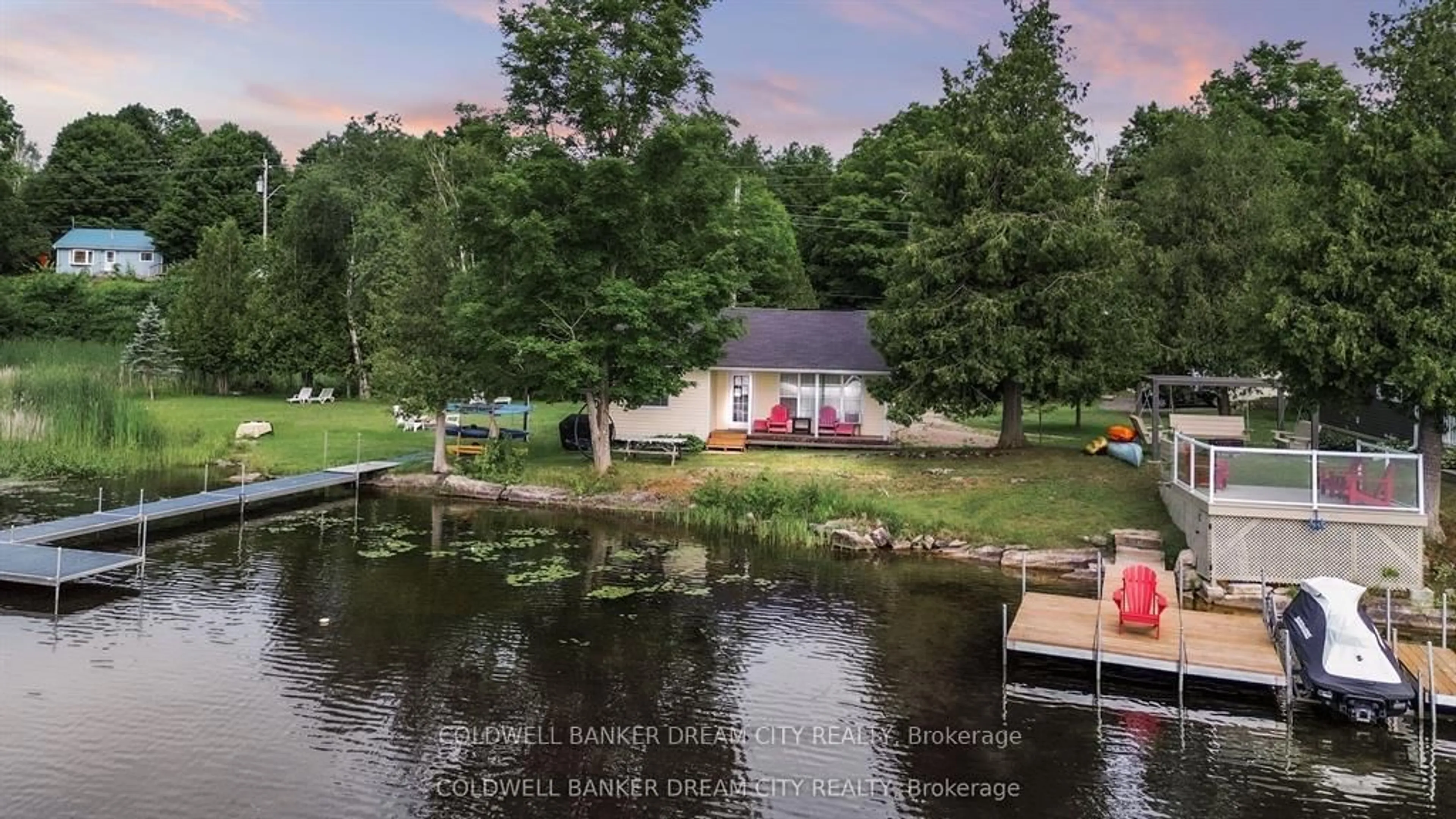 A pic from outside/outdoor area/front of a property/back of a property/a pic from drone, water/lake/river/ocean view for 1004A ALMOND Lane, Arden Ontario K0H 1B0