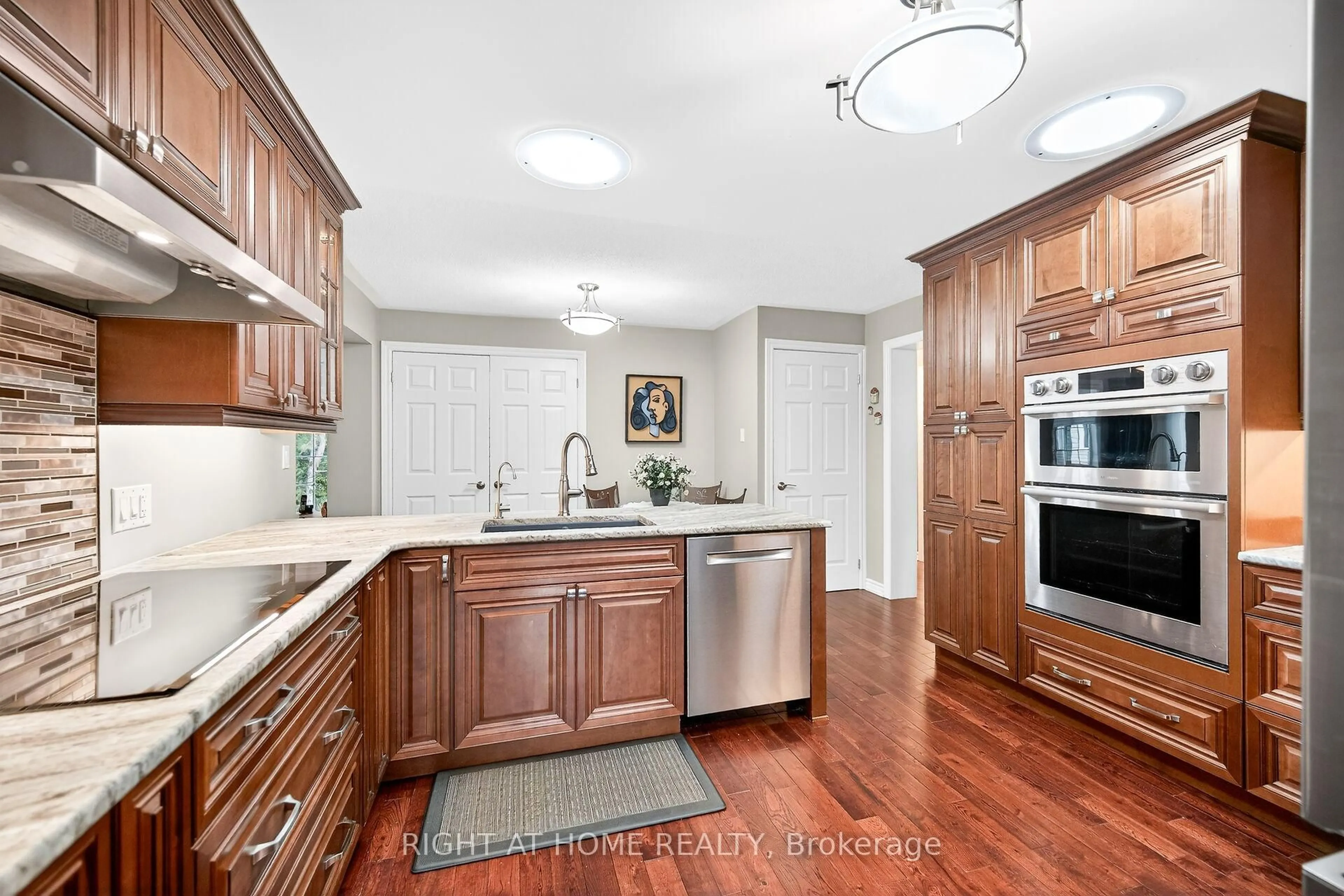 Open concept kitchen, ceramic/tile floor for 110 Kilroot Pl, Hamilton Ontario L8B 1A5