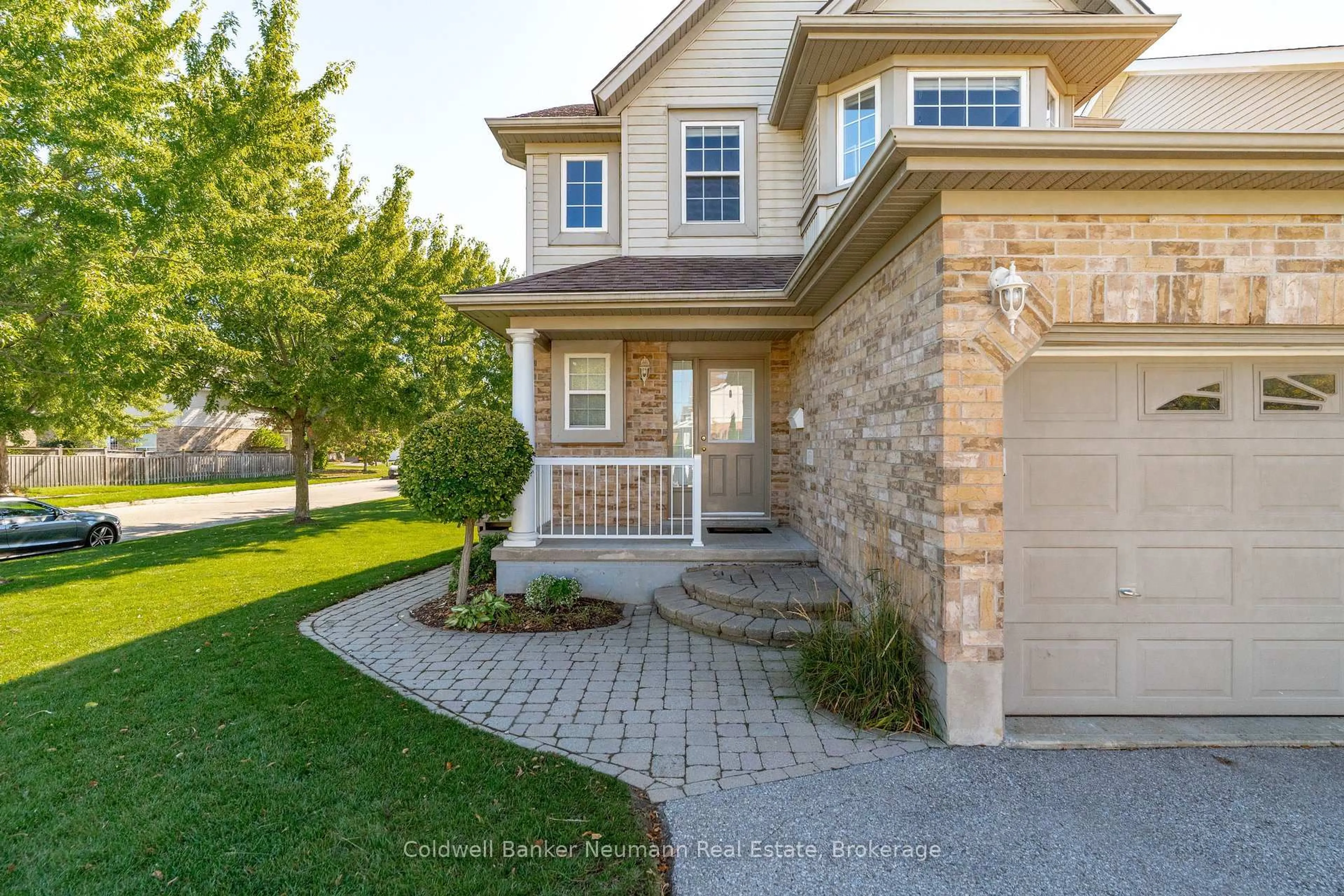 Home with brick exterior material, street for 11 Fuller Dr, Guelph Ontario N1E 7J6