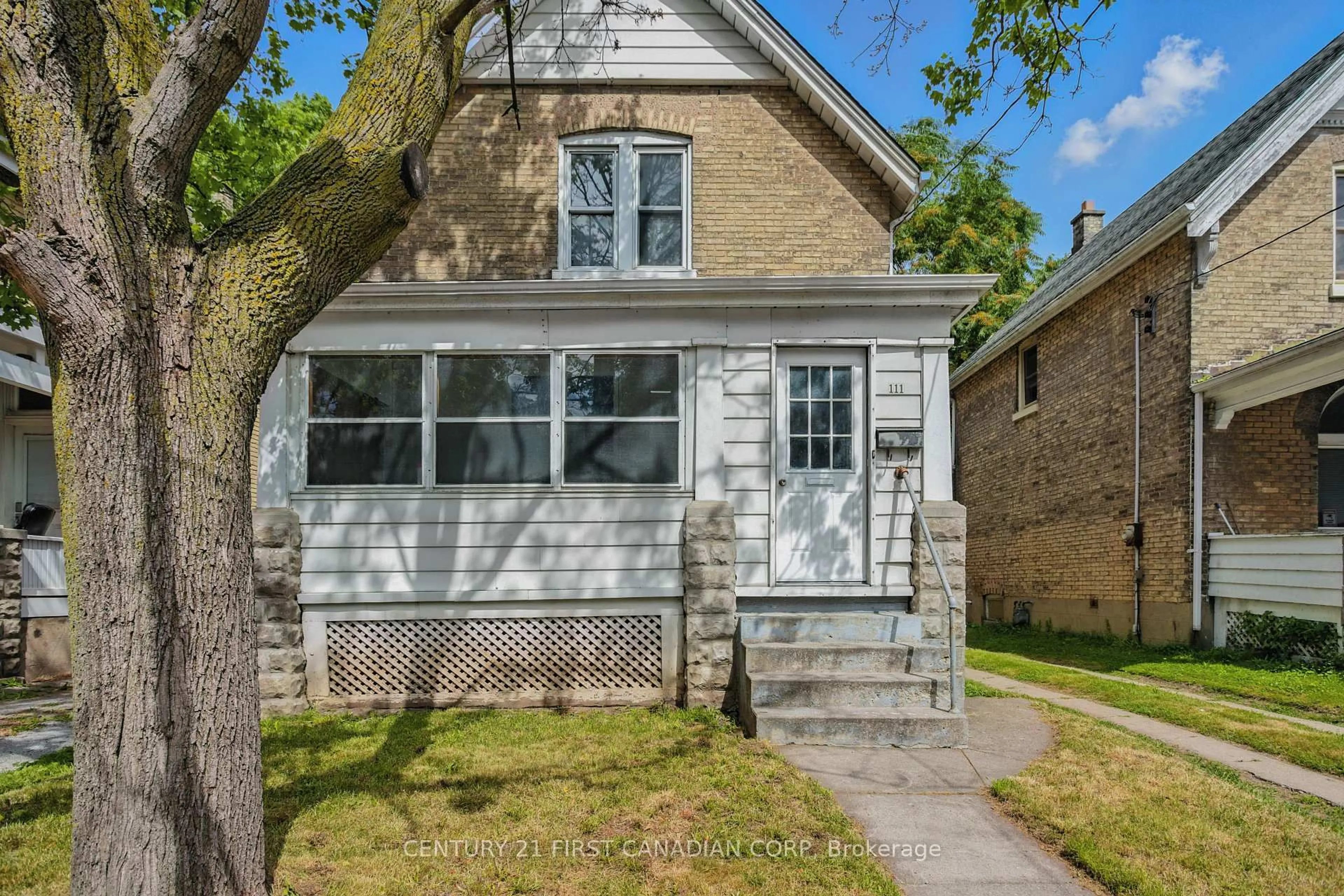 Home with brick exterior material, street for 111 Wharncliffe Rd, London North Ontario N6H 2A8
