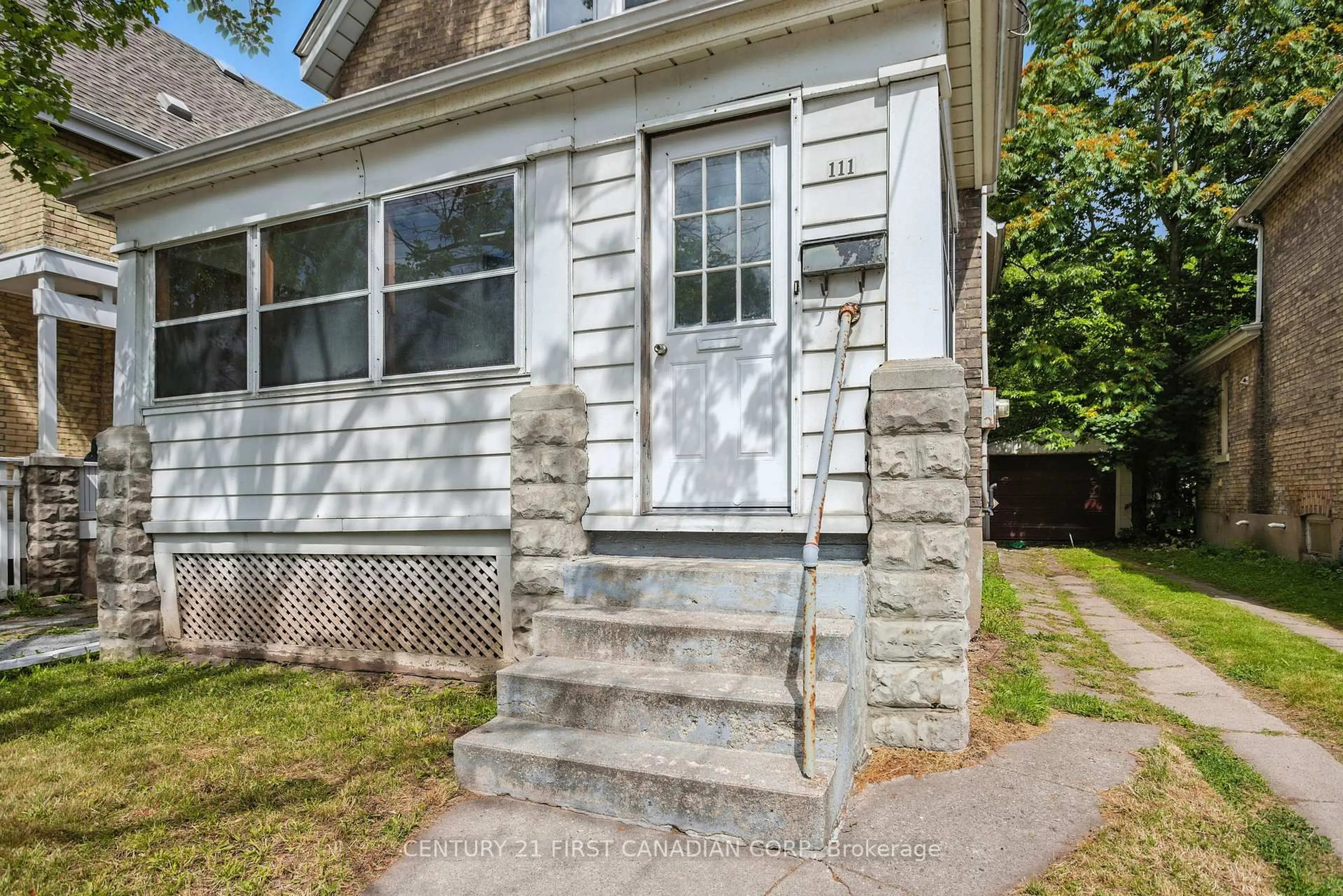 Home with vinyl exterior material, street for 111 Wharncliffe Rd, London North Ontario N6H 2A8