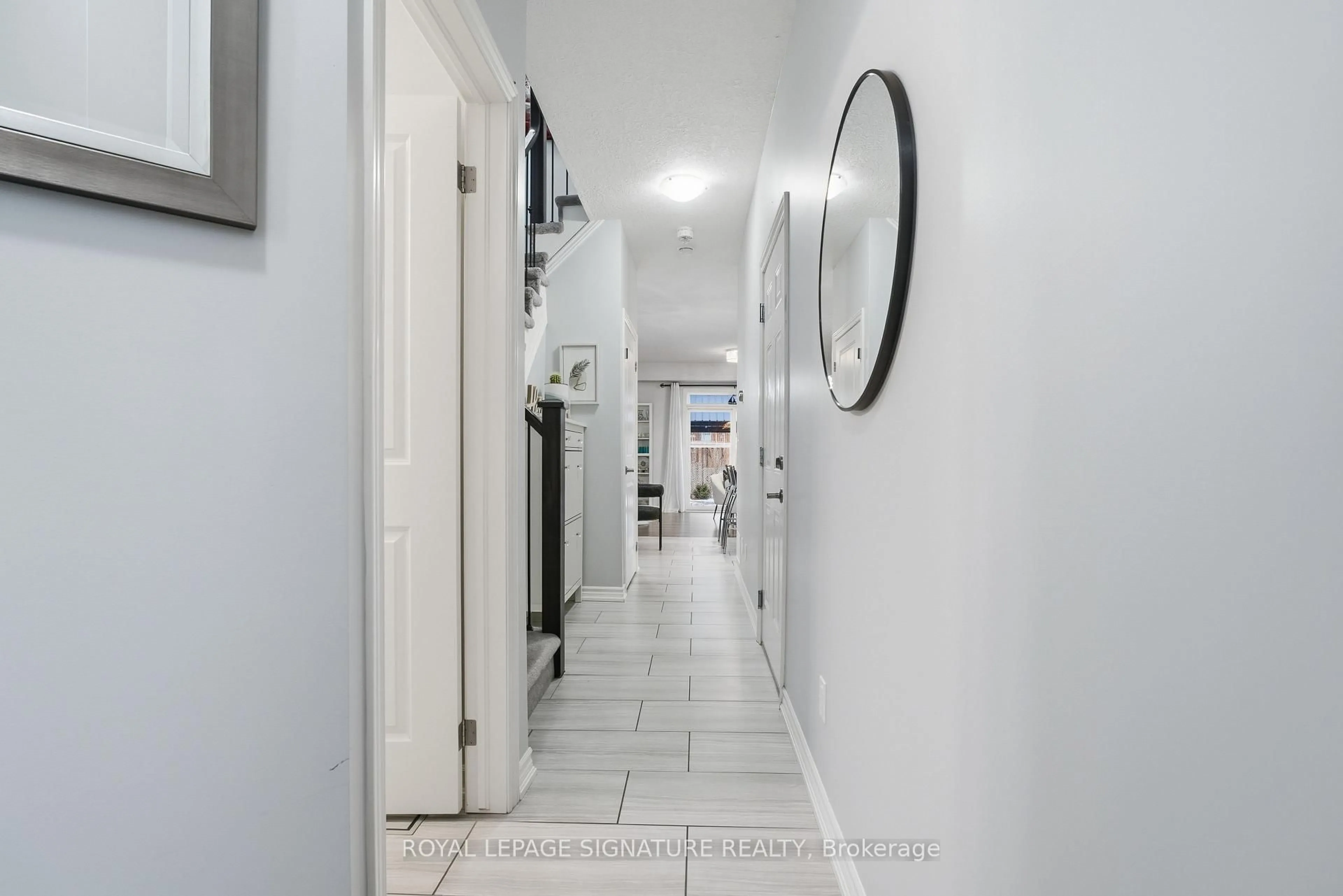 Indoor foyer for 128 Law Dr, Guelph Ontario N1E 0M2