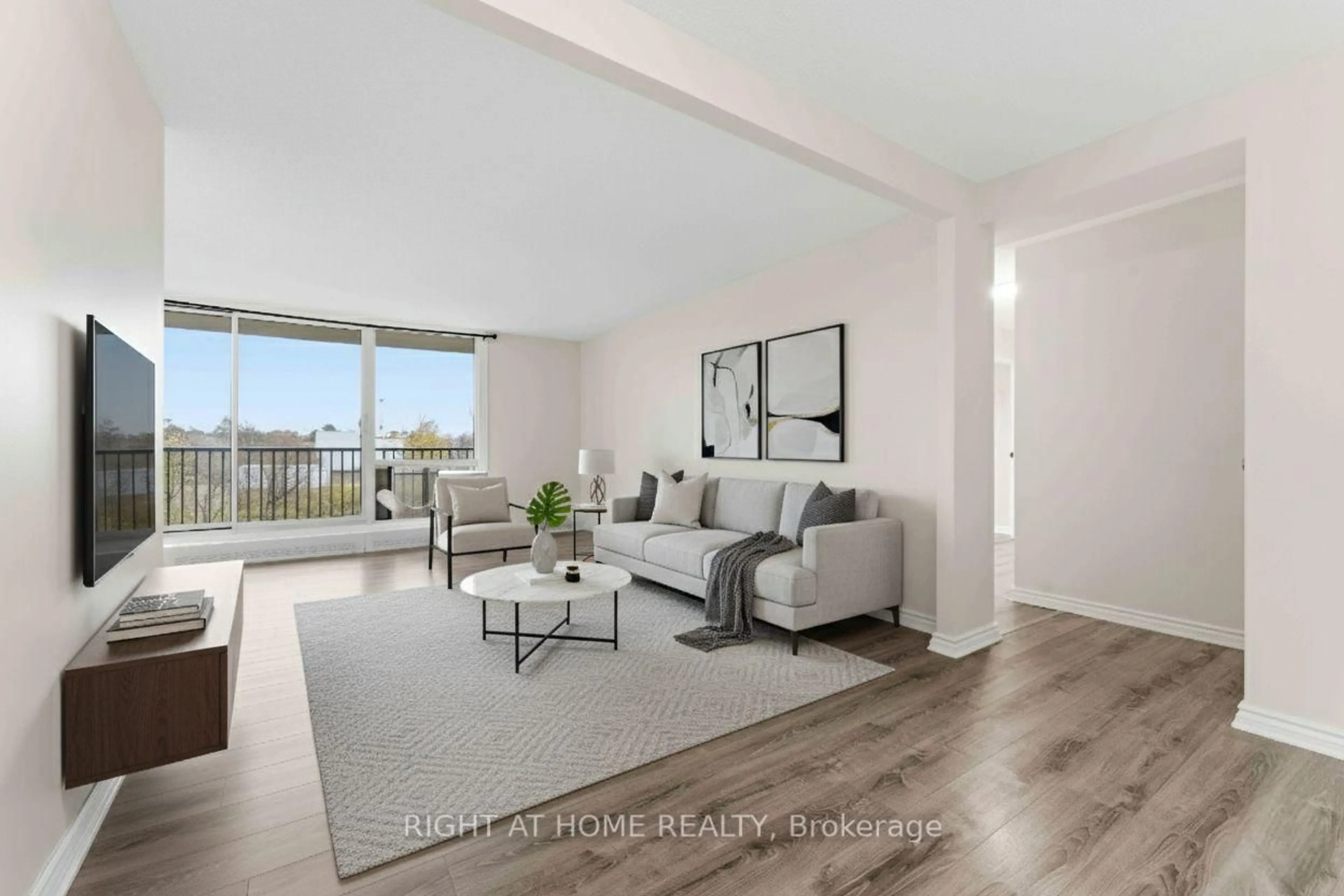 Living room with furniture, unknown for 665 Bathgate Dr #311, Ottawa Ontario K1K 3Y4