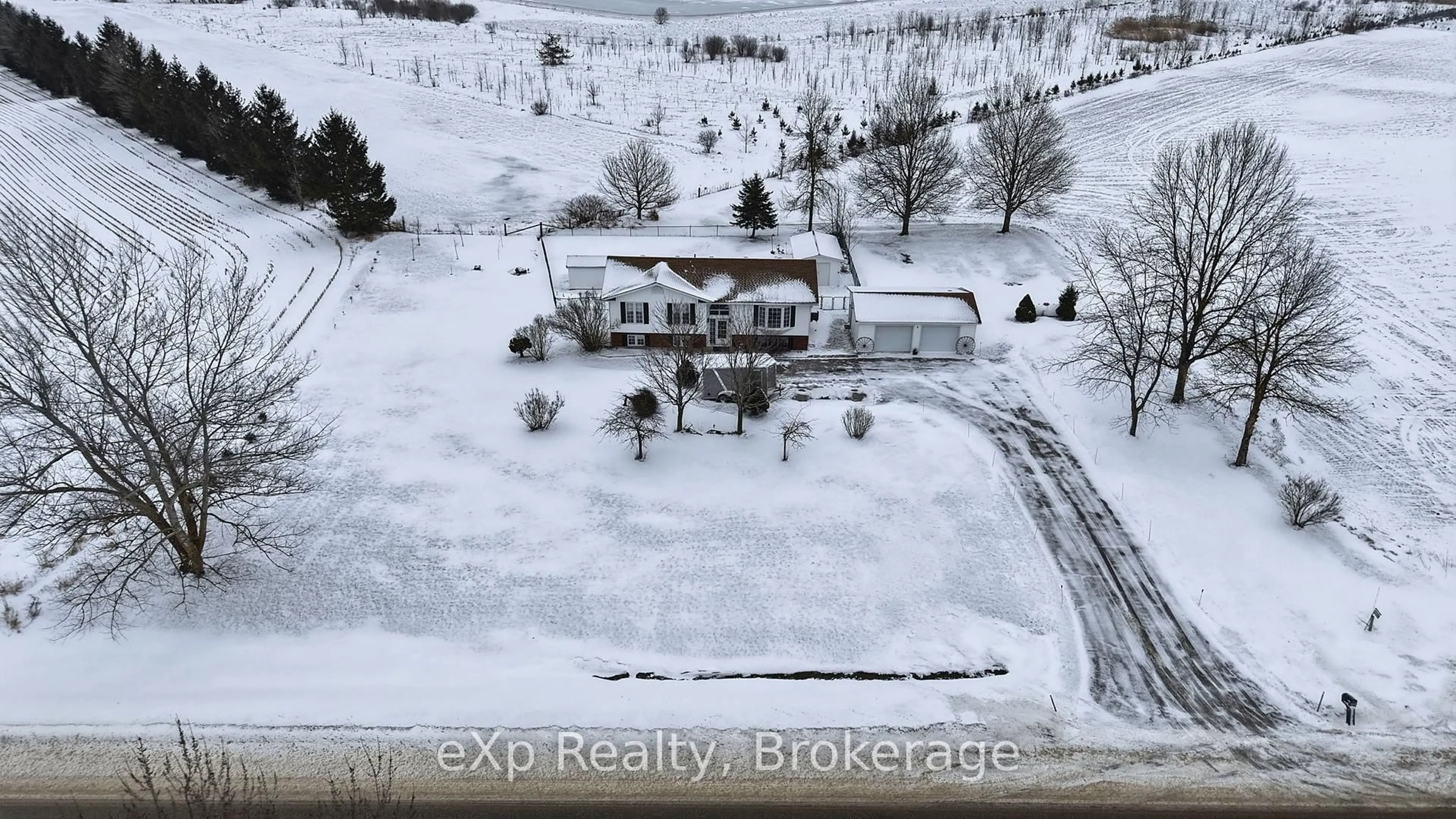 A pic from outside/outdoor area/front of a property/back of a property/a pic from drone, building for 9825 West Heritage St, Minto Ontario N0G 1M0