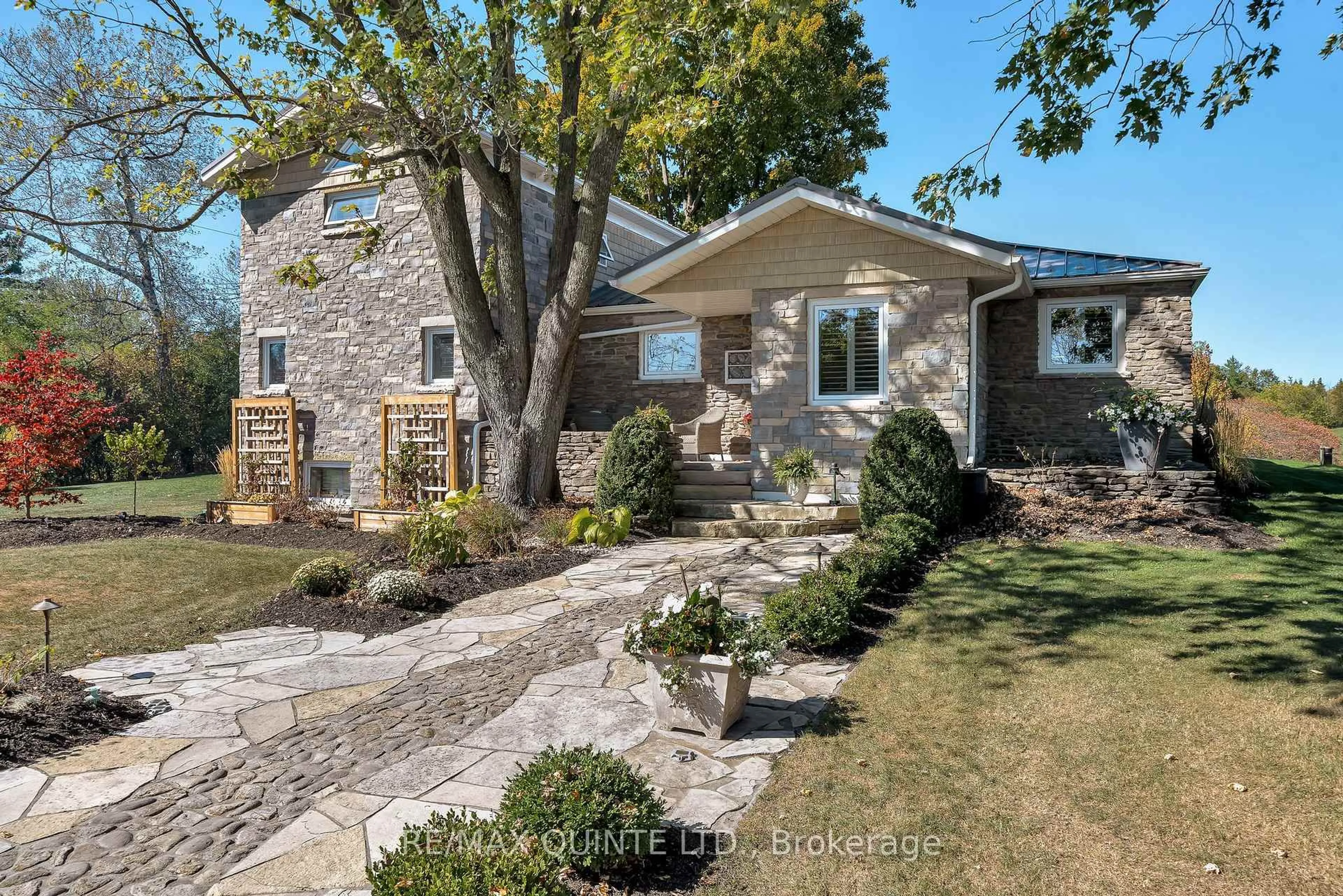 Home with brick exterior material, street for 1245 Miller Rd, Prince Edward County Ontario K0K 2T0