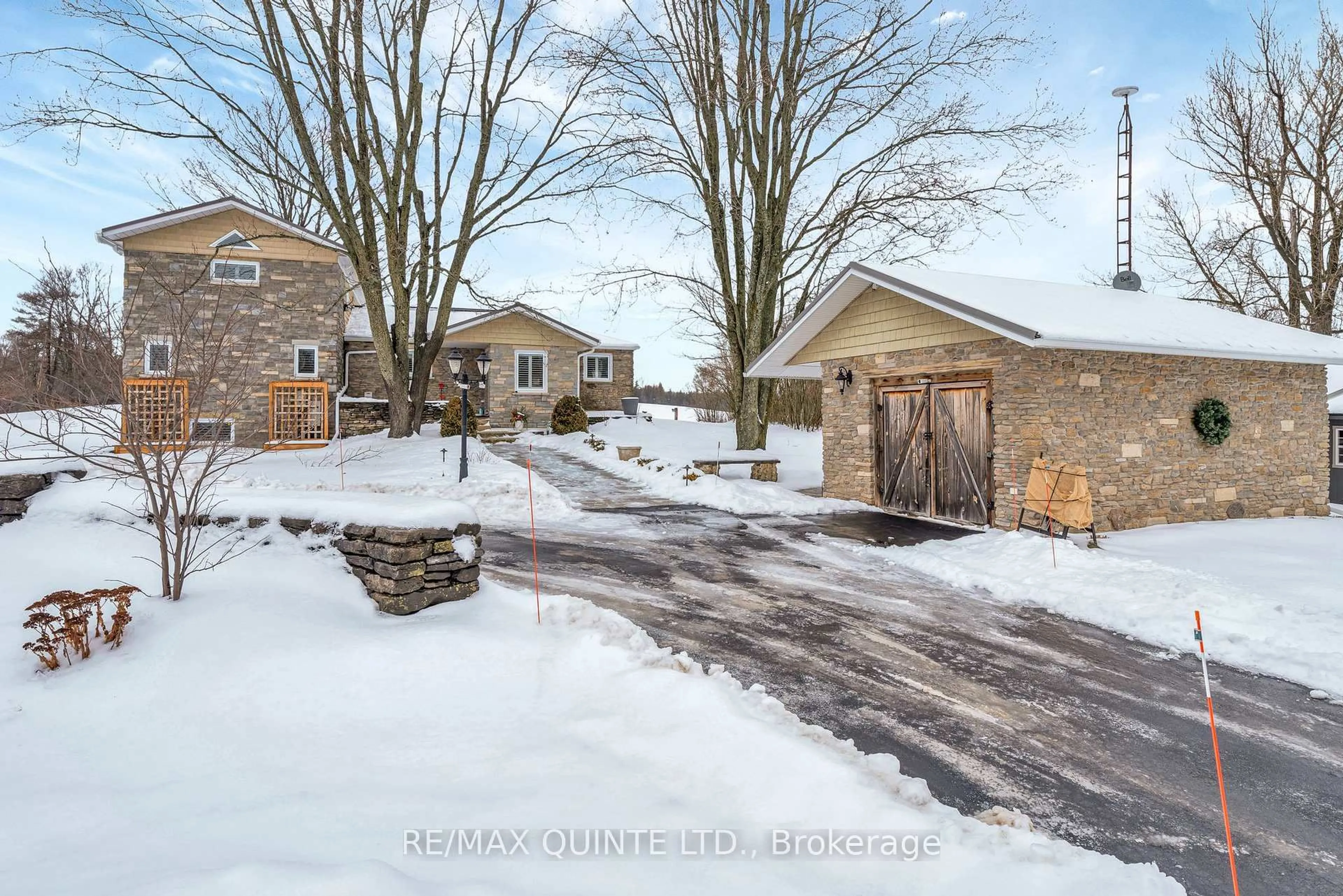 A pic from outside/outdoor area/front of a property/back of a property/a pic from drone, street for 1245 Miller Rd, Prince Edward County Ontario K0K 2T0