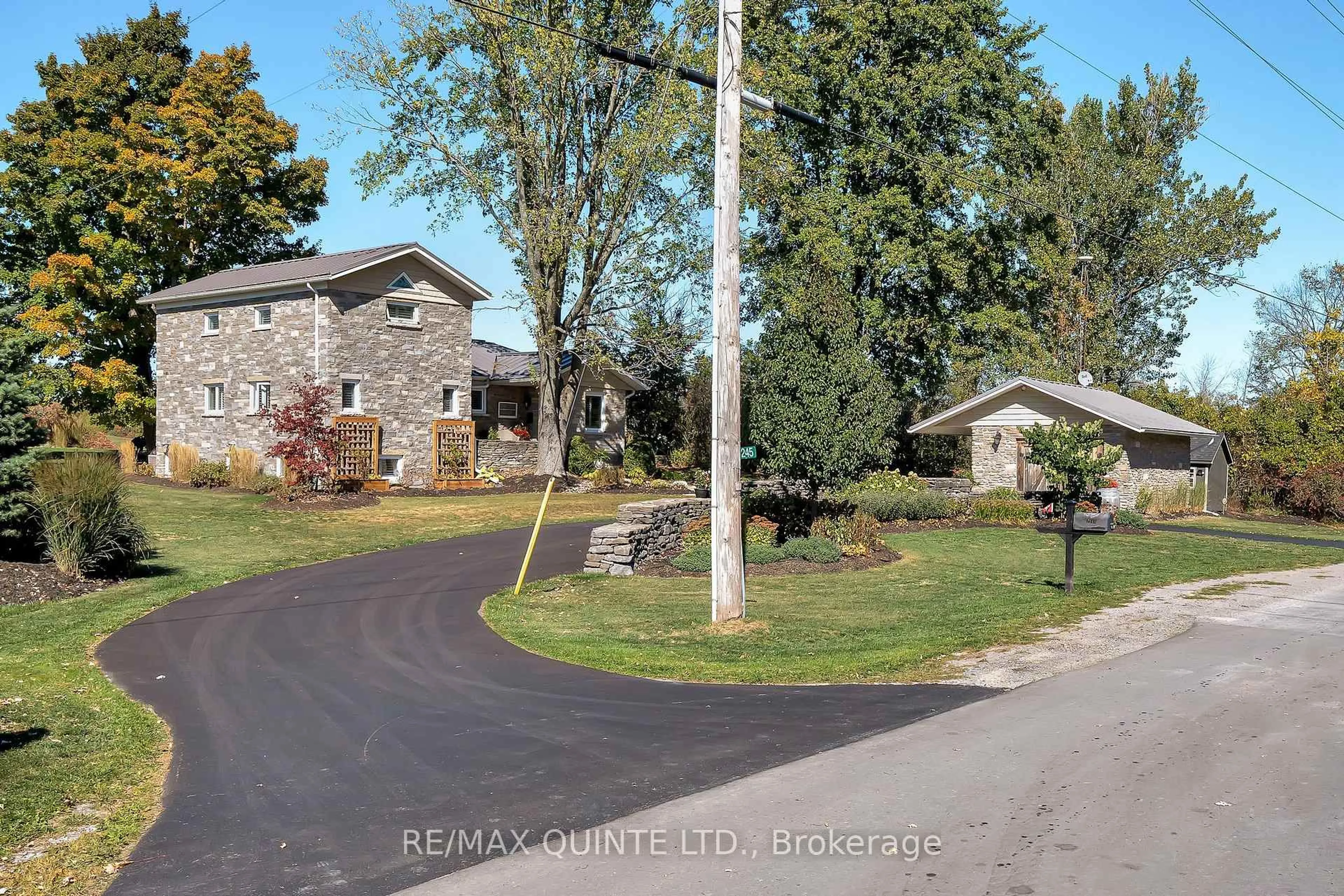 A pic from outside/outdoor area/front of a property/back of a property/a pic from drone, street for 1245 Miller Rd, Prince Edward County Ontario K0K 2T0