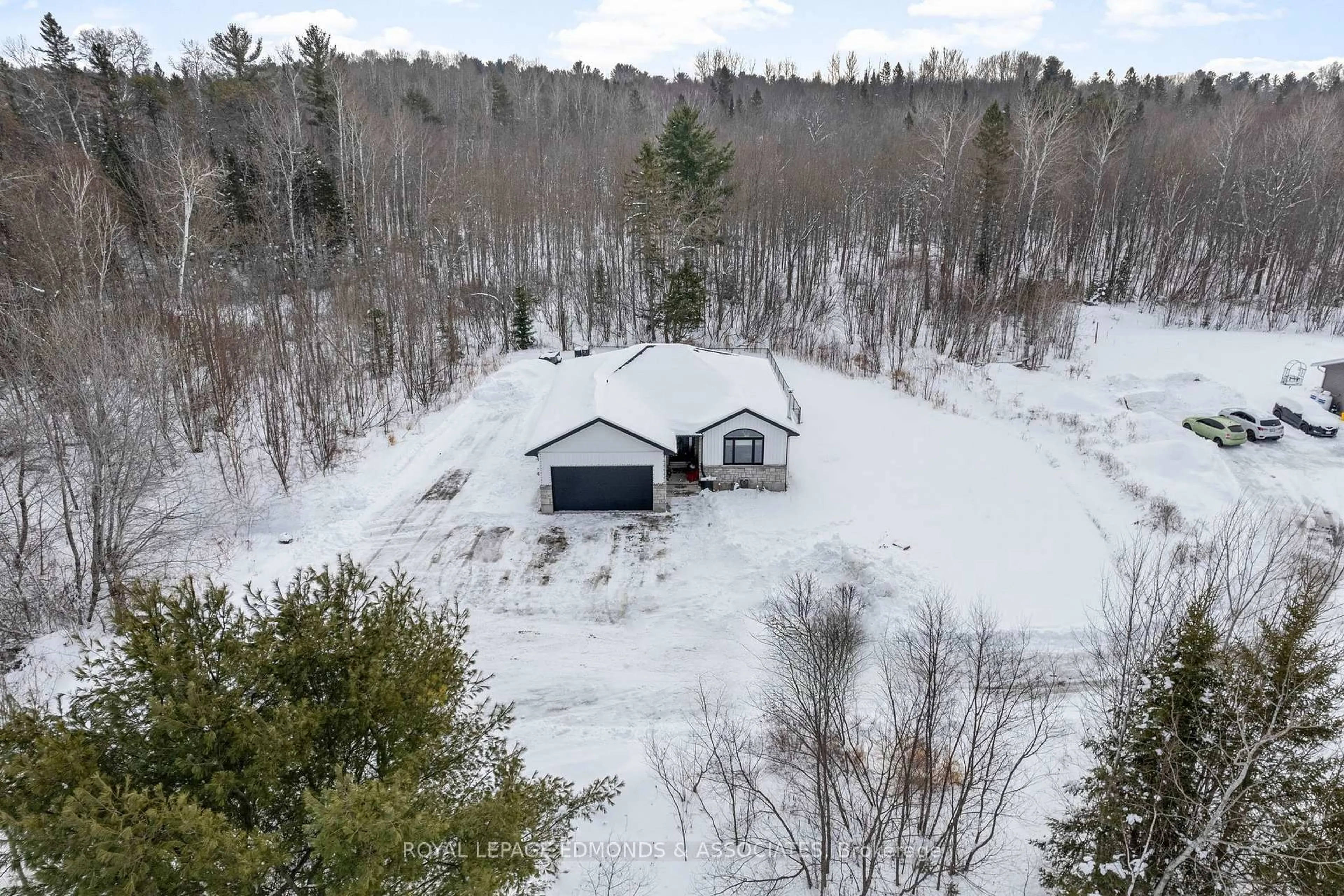 A pic from outside/outdoor area/front of a property/back of a property/a pic from drone, forest/trees view for 91 Sandy Beach Rd, Pembroke Ontario K8A 6W8