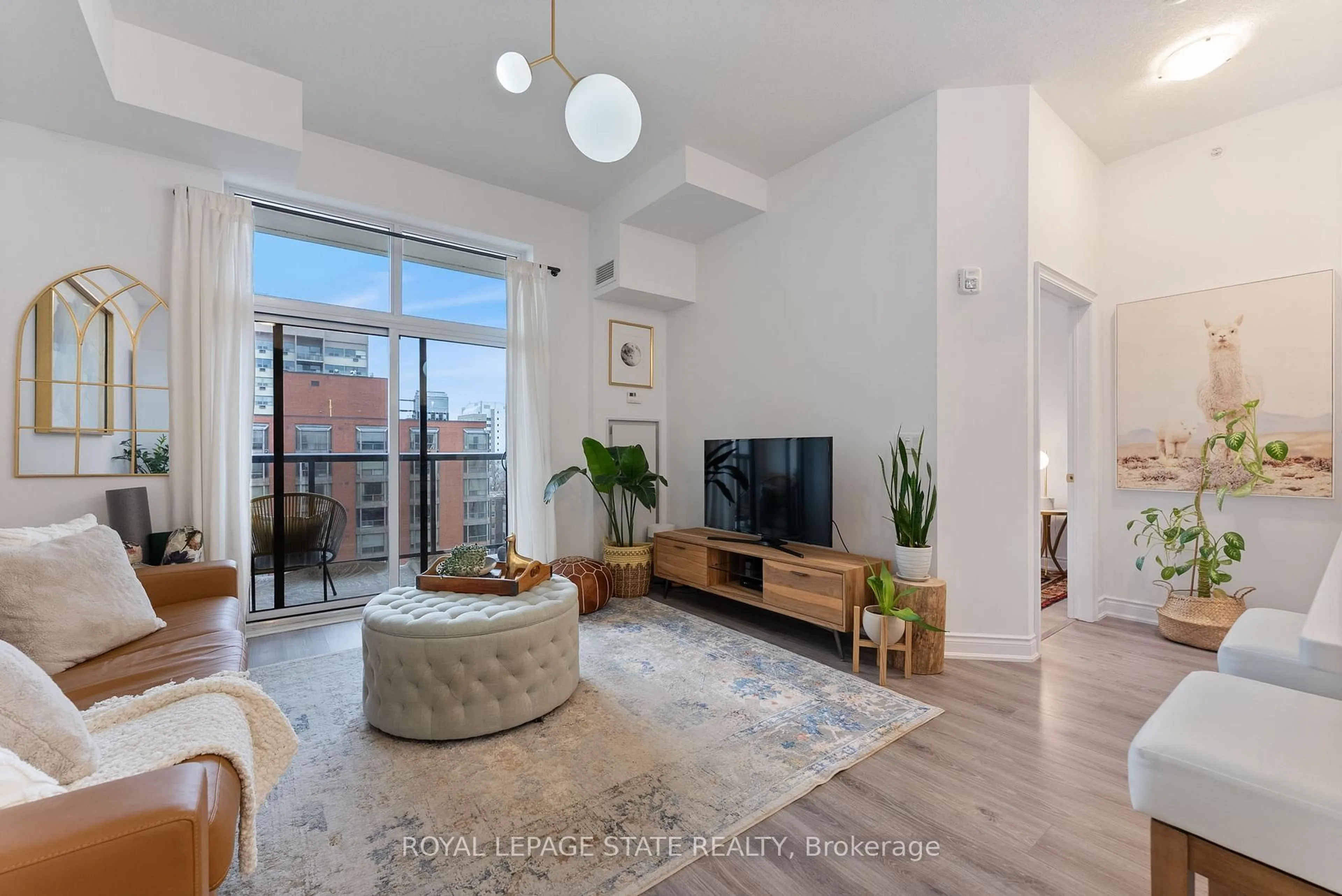 Living room with furniture, unknown for 81 Robinson St #1008, Hamilton Ontario L8P 0C2