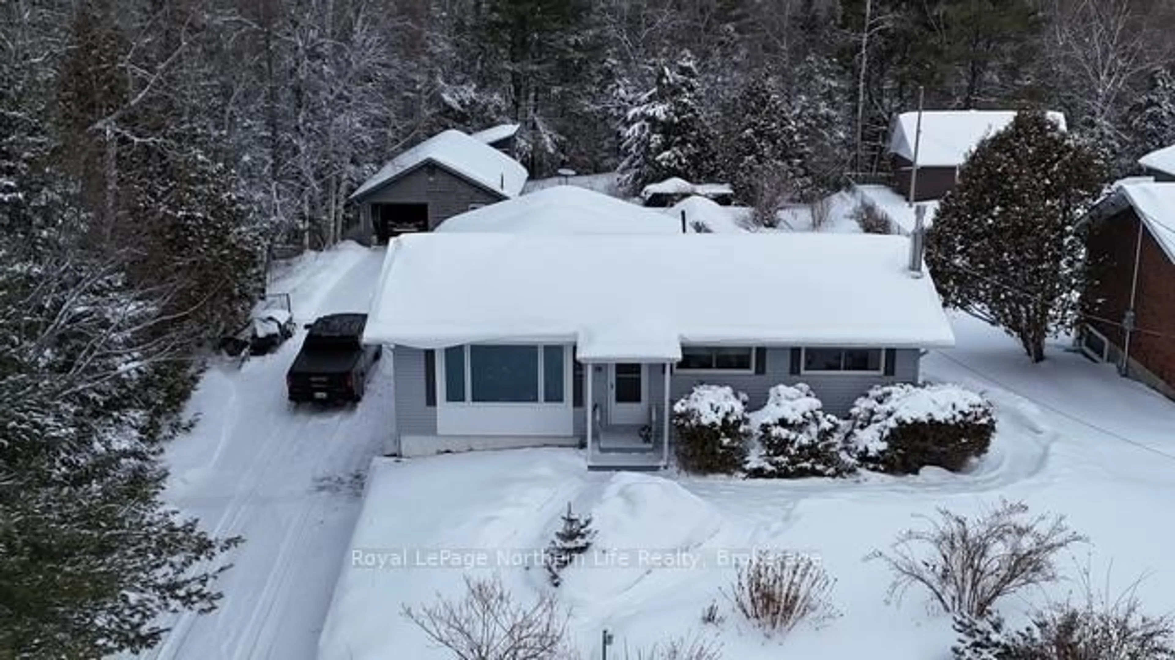 A pic from outside/outdoor area/front of a property/back of a property/a pic from drone, street for 50 O'Connor Dr, Temagami Ontario P0H 2H0