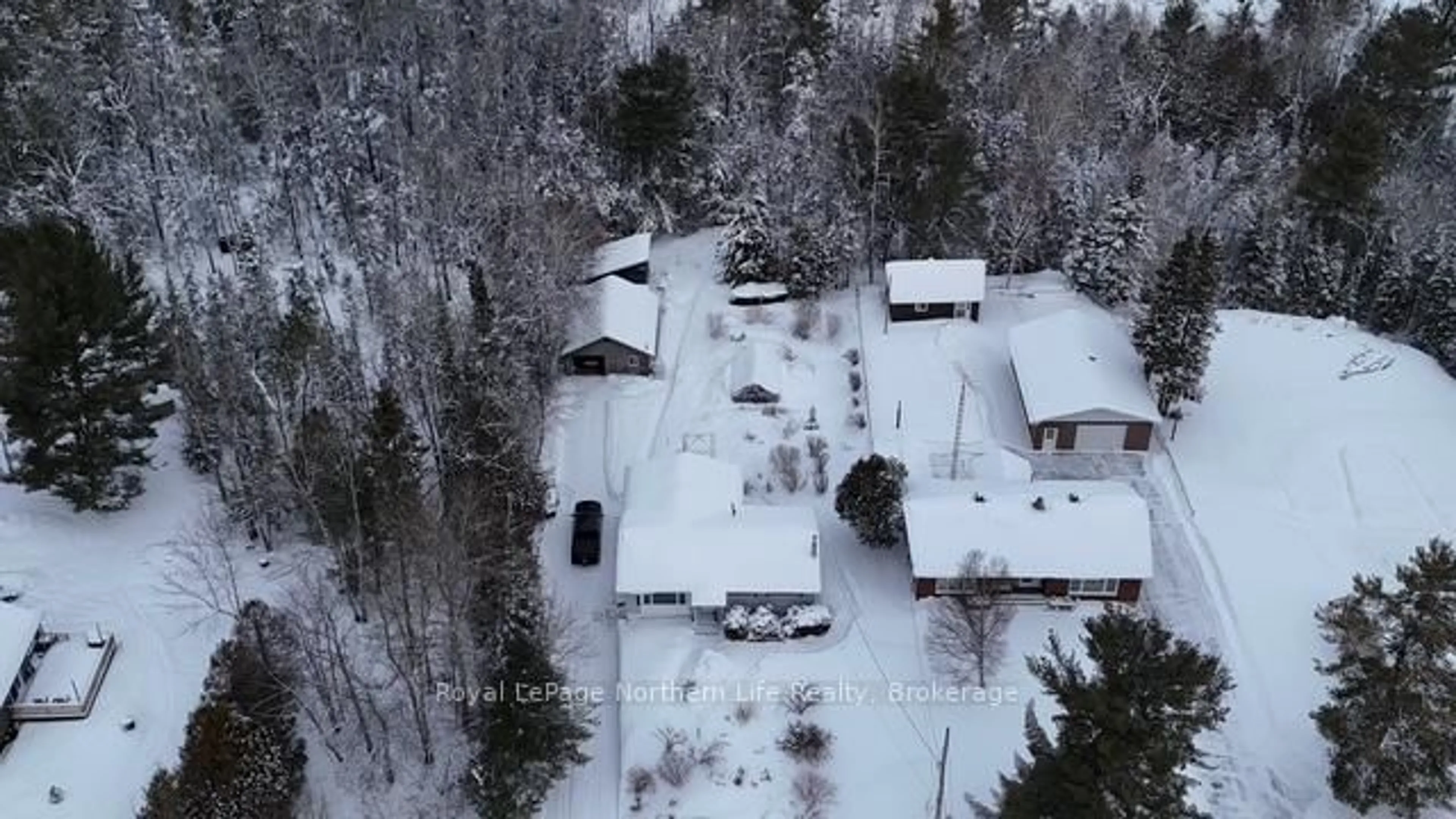 A pic from outside/outdoor area/front of a property/back of a property/a pic from drone, street for 50 O'Connor Dr, Temagami Ontario P0H 2H0
