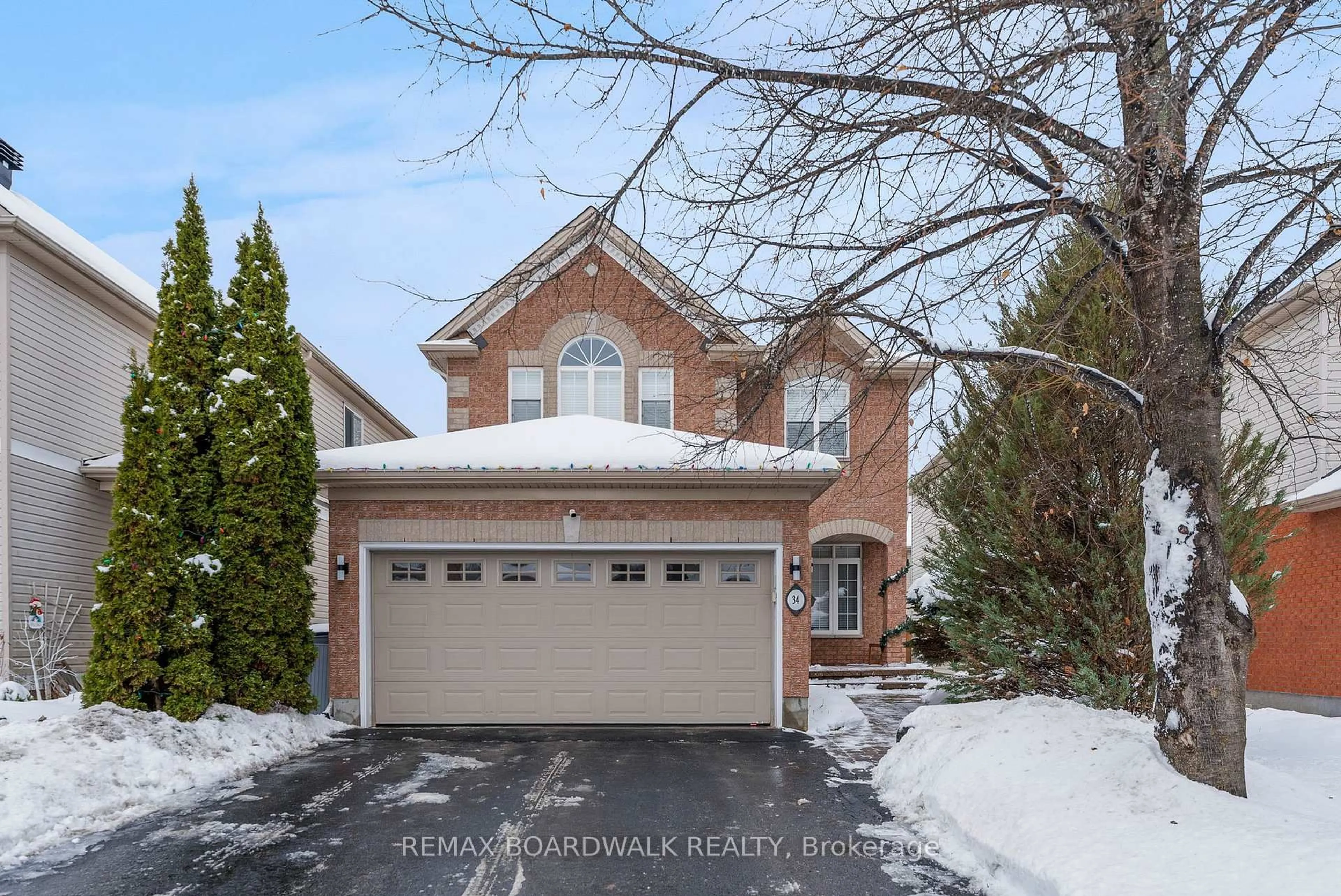 Home with brick exterior material, street for 34 Catterick Cres, Ottawa Ontario K2K 3M5
