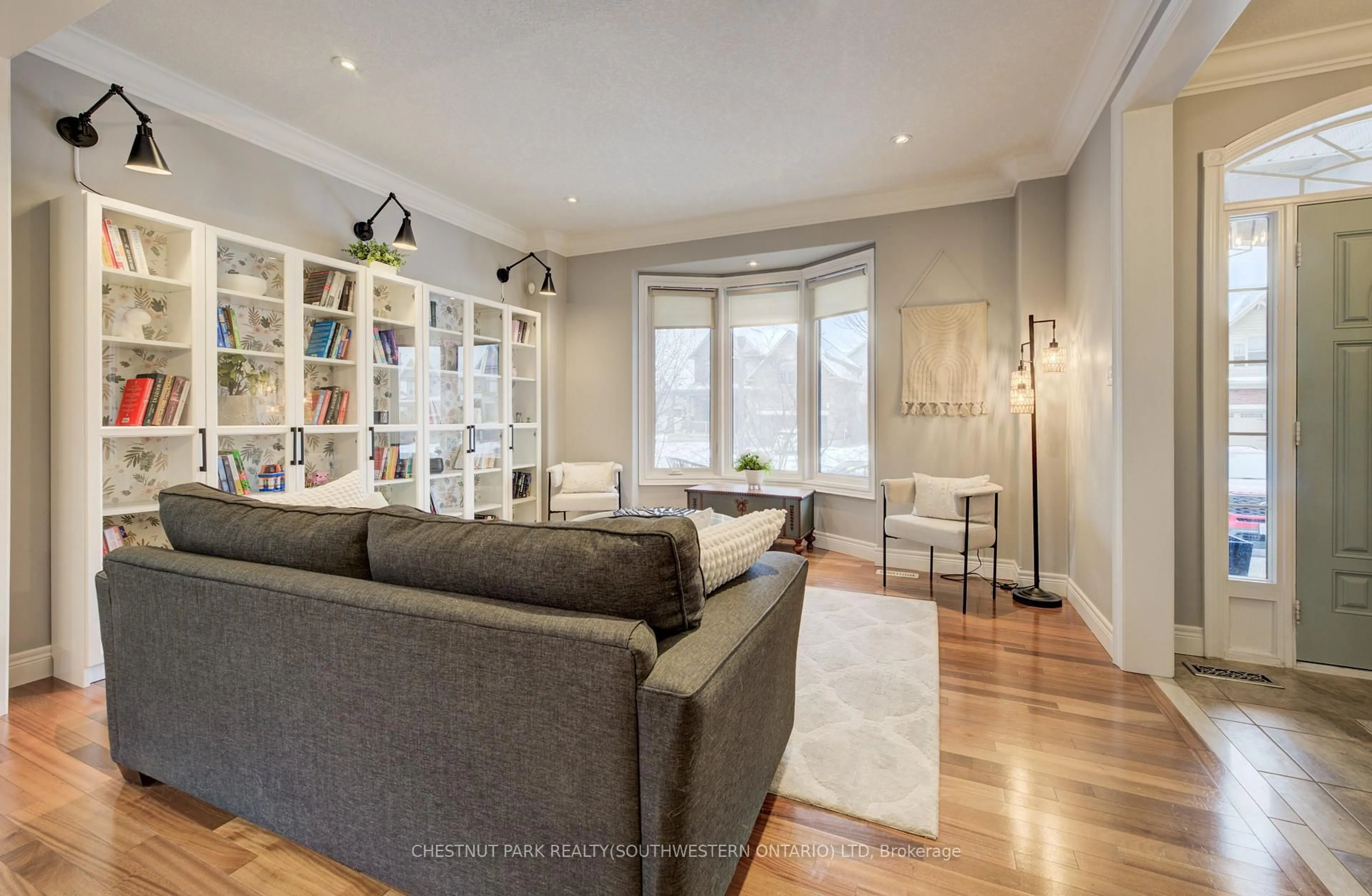 Living room with furniture, wood/laminate floor for 11 Tremaine Dr, Kitchener Ontario N2A 4L9