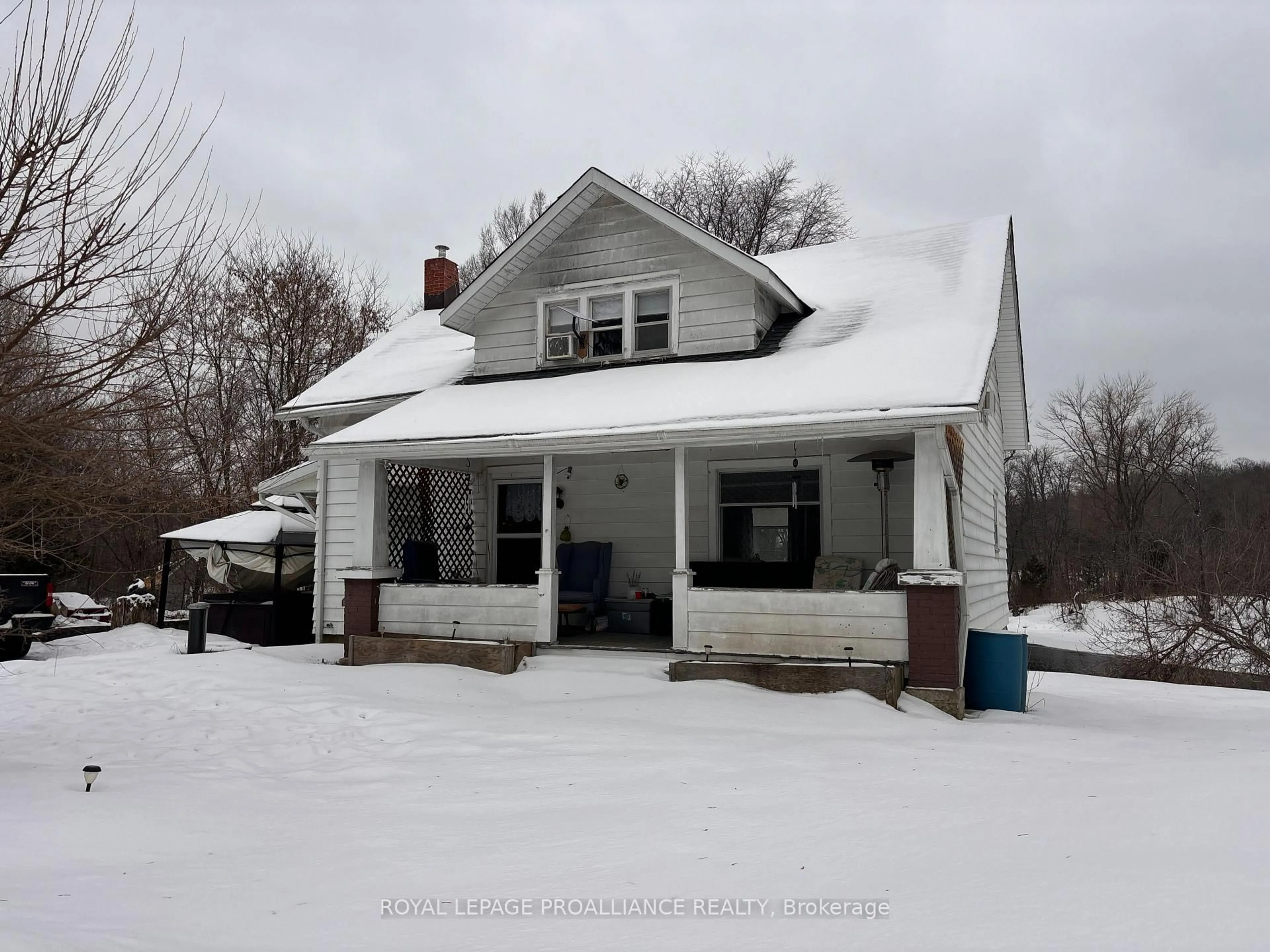 A pic from outside/outdoor area/front of a property/back of a property/a pic from drone, street for 1022 Bridge St, Arden Ontario K0H 1B0