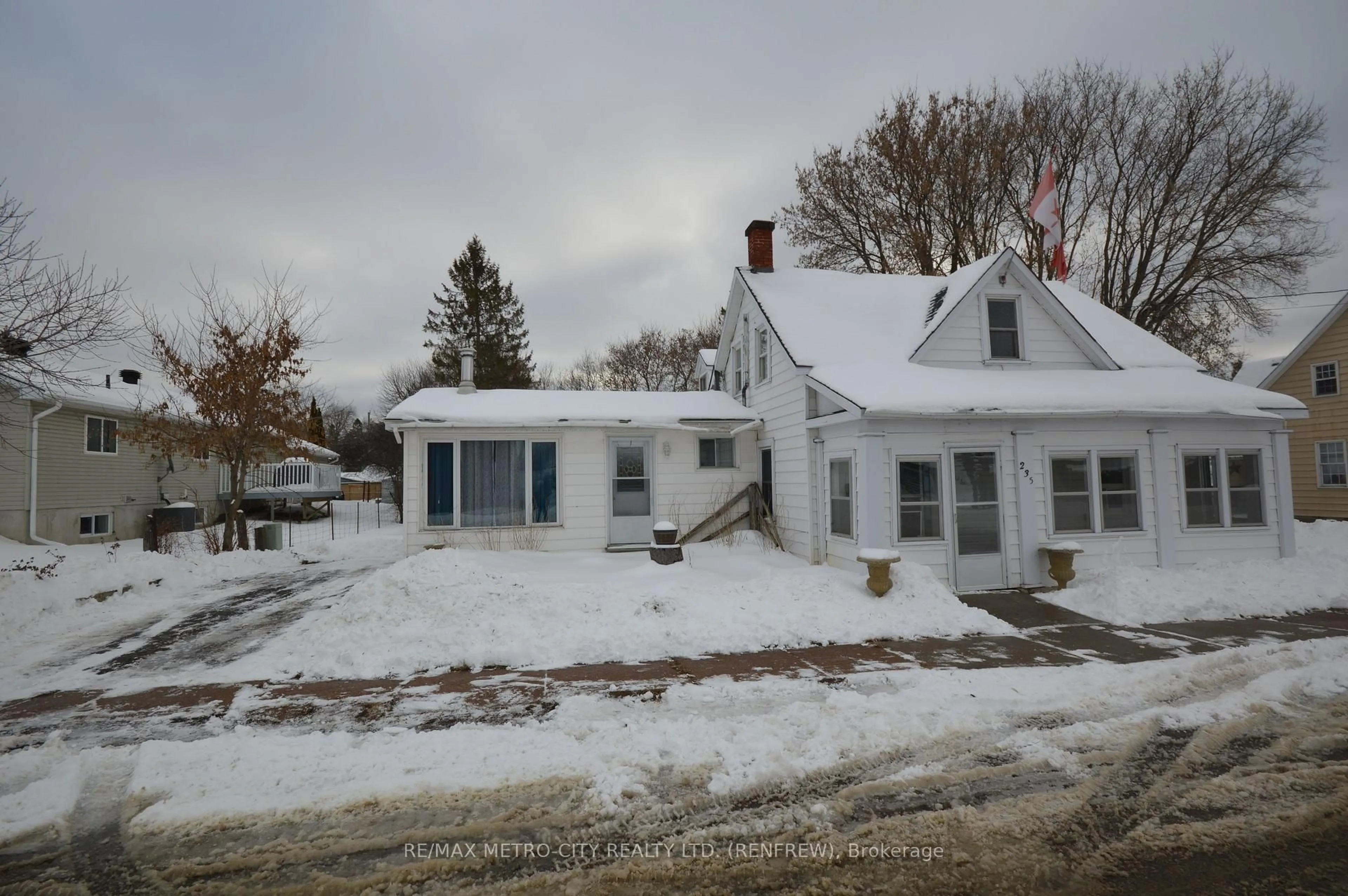 A pic from outside/outdoor area/front of a property/back of a property/a pic from drone, street for 235 Renfrew Ave, Renfrew Ontario K7V 2Y7