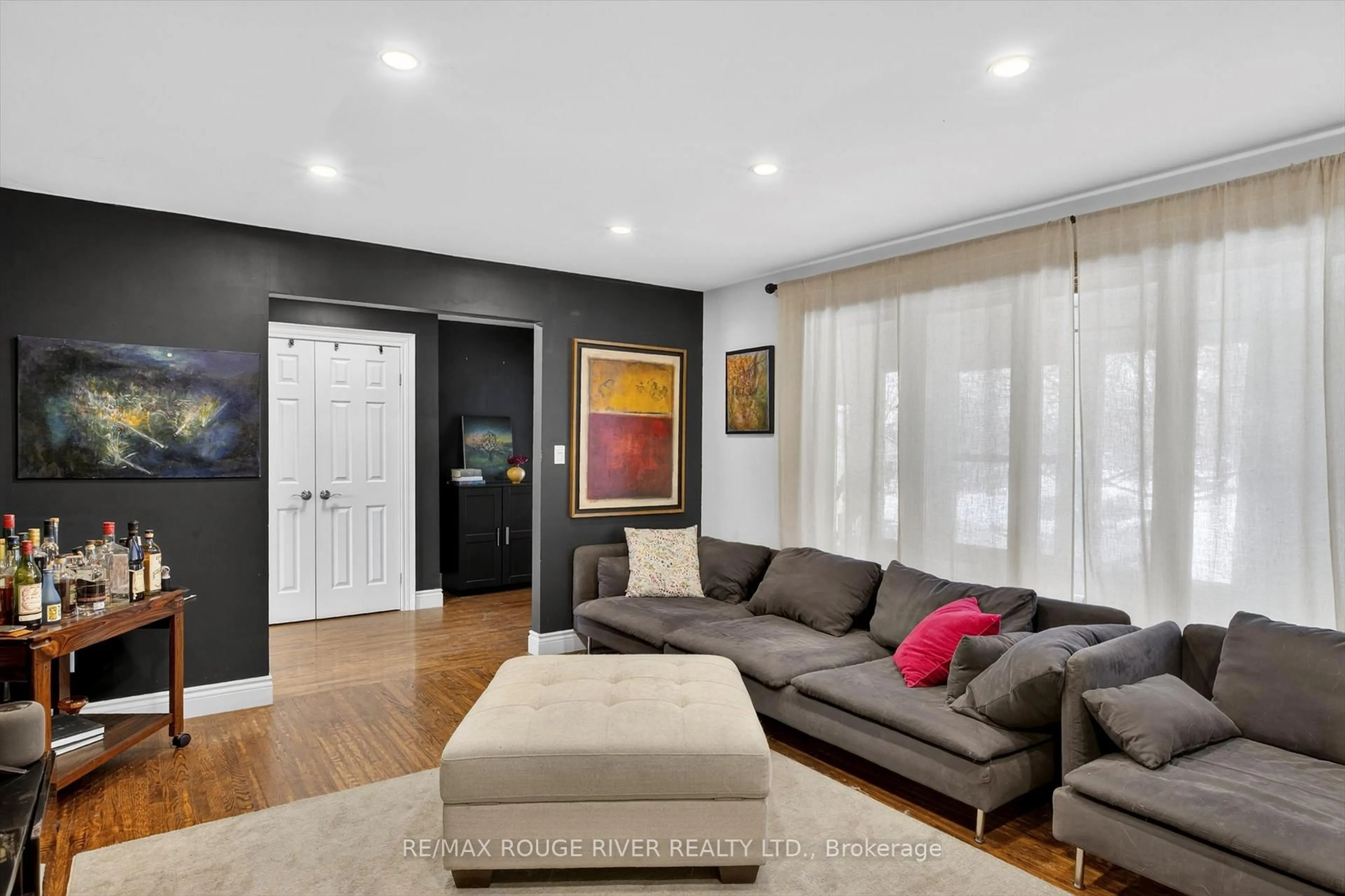 Living room with furniture, wood/laminate floor for 2401 15TH Line, Selwyn Ontario K0L 2H0